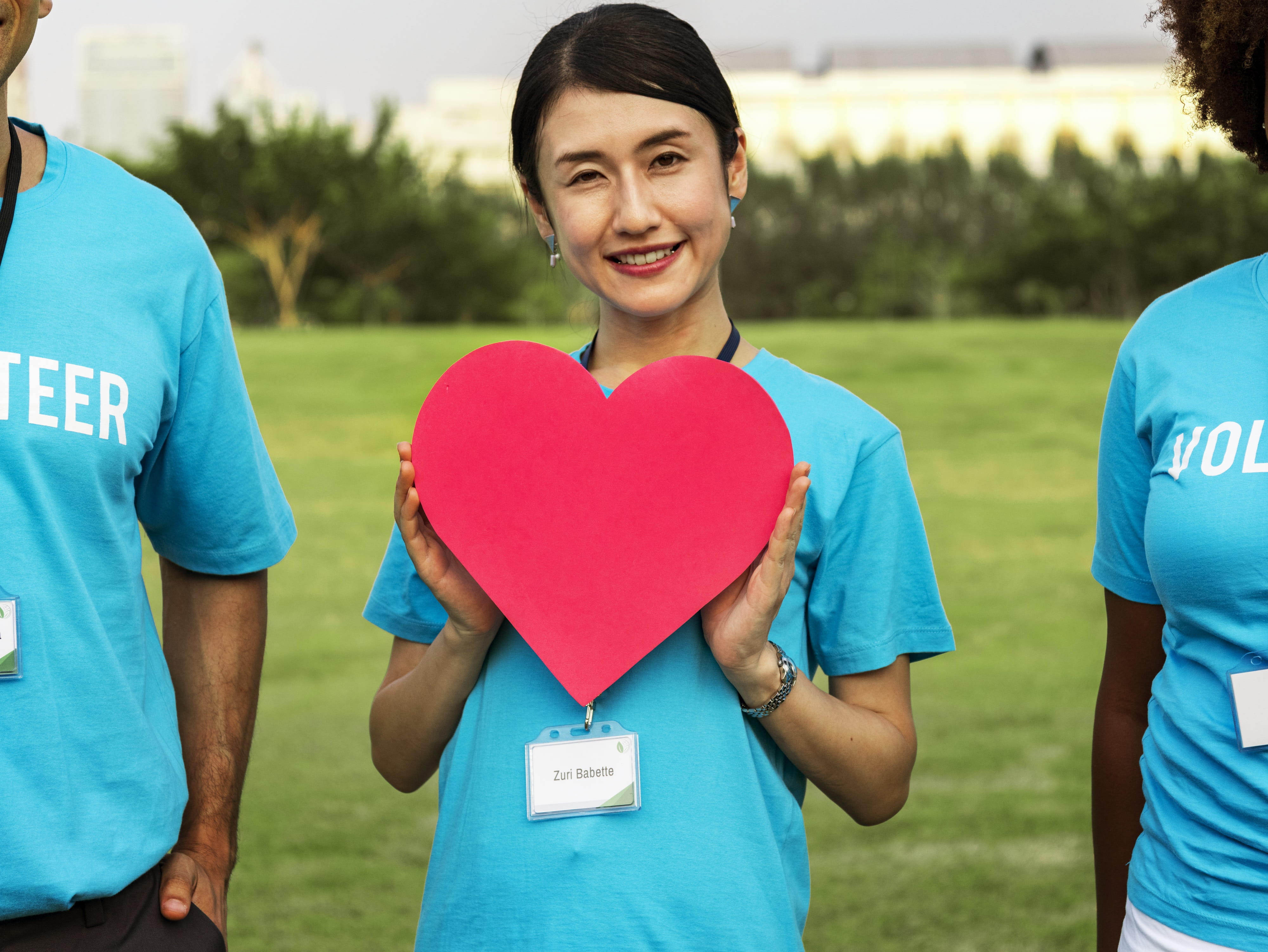 care, smiling, heart shape, organization, non profit, blue, hanging badge, 4K, group, community, adult, kindness, men, love, healthcare, people, day, real people, HD Wallpaper