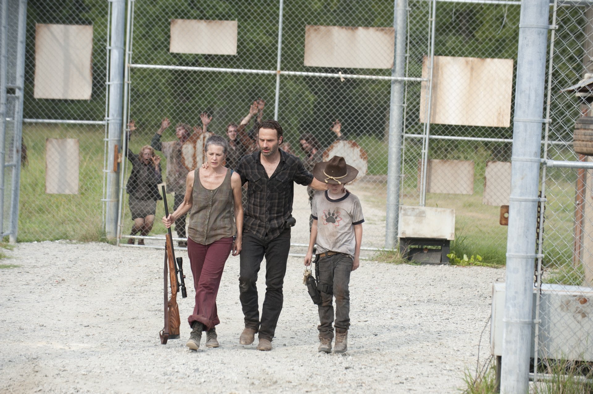 Melissa Mcbride, barrier, TV Show, Carol Peletier, togetherness, people, outdoors, casual clothing, Rick Grimes, fence, Chandler Riggs, portrait, Carl Grimes, HD Wallpaper