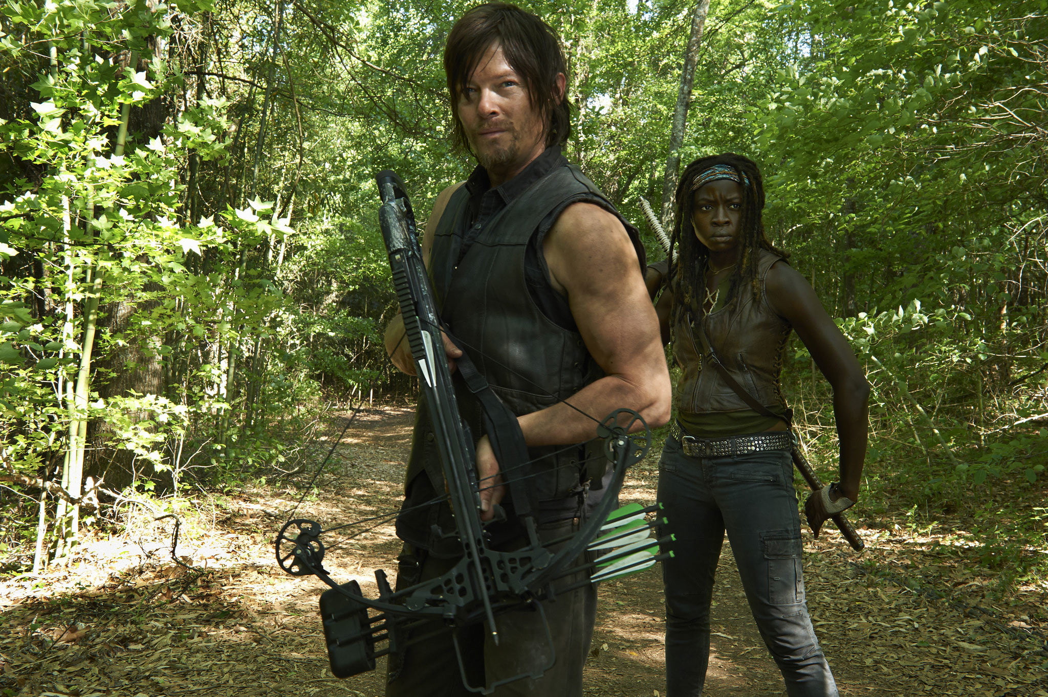 looking at camera, the series, The Walking Dead, casual clothing, aggression, nature, land, Danai Gurira, Daryl Dixon, forest, outdoors, crossbow, front view, HD Wallpaper