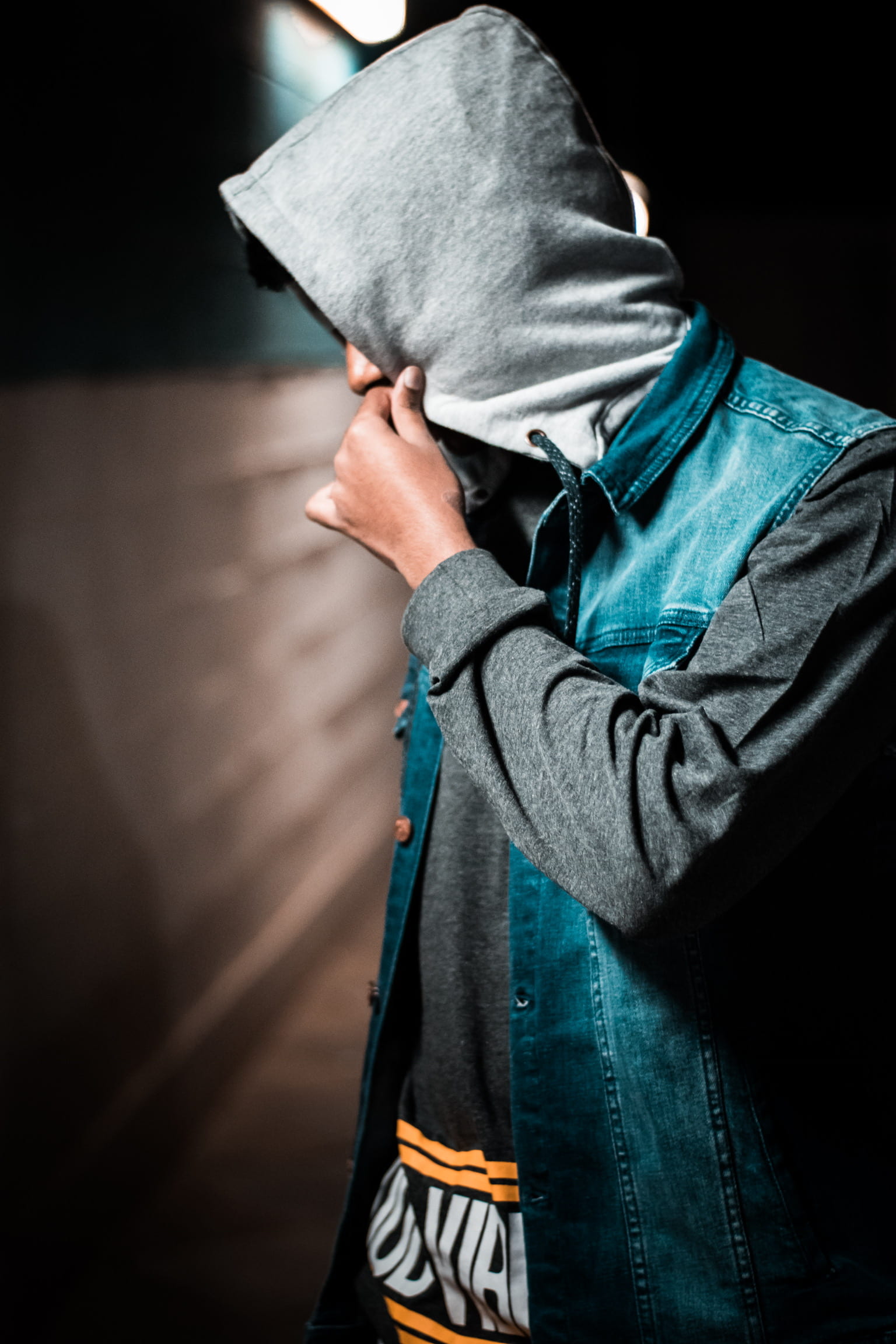 jacket, focus on foreground, standing, jeans, holding, hood, denim, leisure activity, architecture, 1080P, person, day, hood - clothing, near, adult, one person, Phone HD Wallpaper