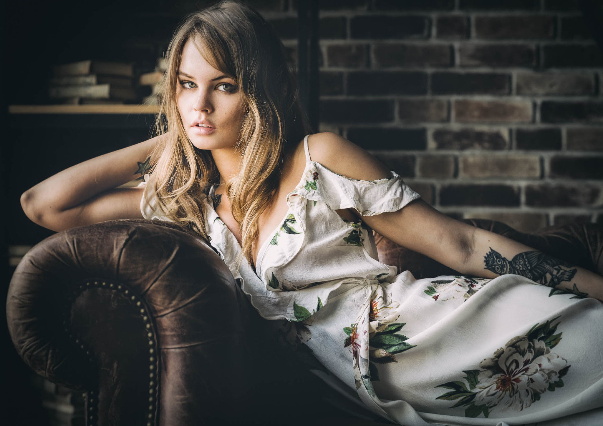 blue eyes, contemplation, portrait, brick wall, couch, looking at viewer, Anastasia Scheglova, 1080P, women, hairstyle, blonde, young women, white dress, HD Wallpaper