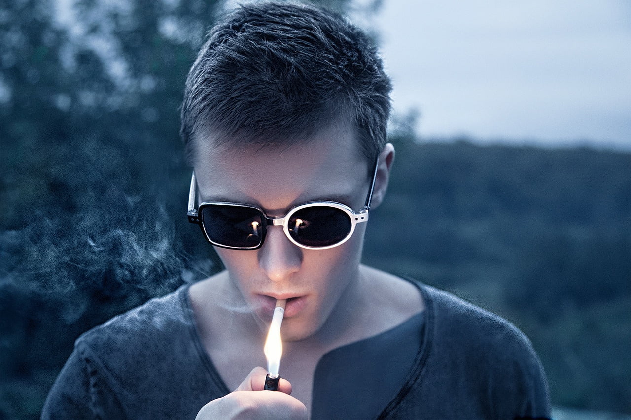 young men, men, real people, burning, front view, lighter, portrait, glasses, holding, 720P, cigarettes, leisure activity, headshot, nature, one person, HD Wallpaper