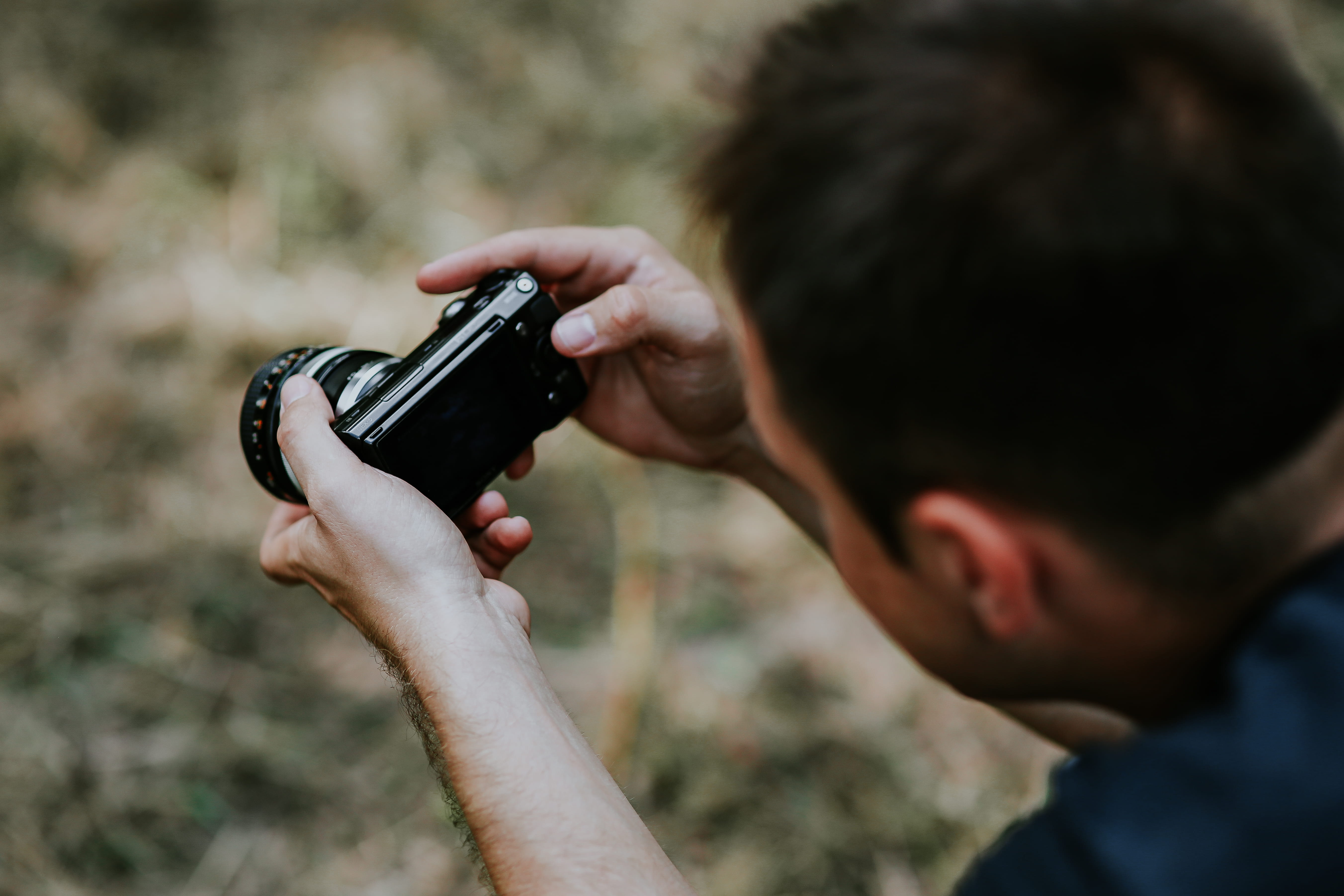 holding, hand, Photographer, young adult, woman, human body part, crime, focus on foreground, work, gun, beautiful, photography, men, day, aiming, technology, HD Wallpaper