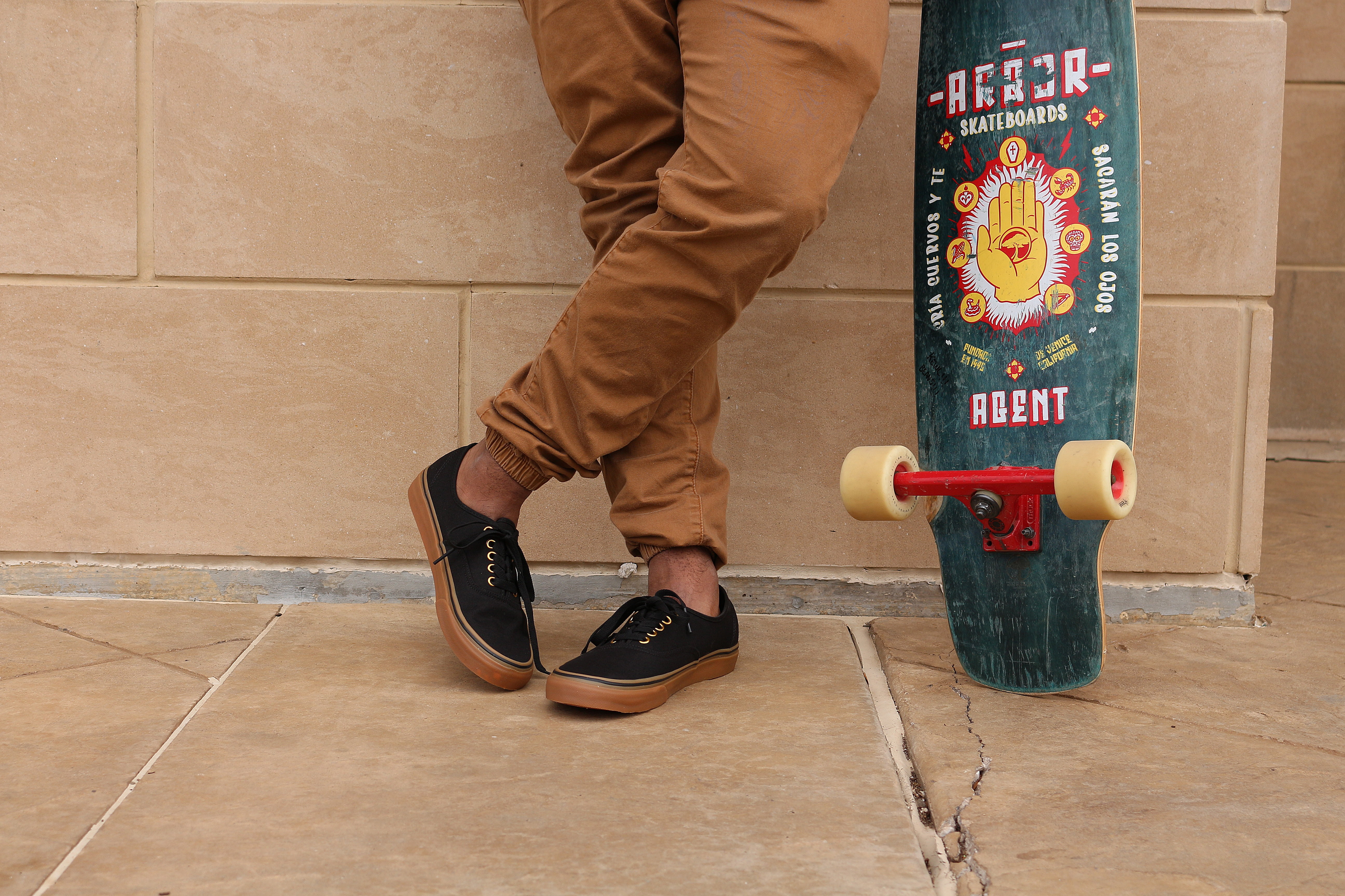 motion, real people, skateboard, casual clothing, green, floor, sneakers, leaning, holding, indoors, sport, longboard, tiled floor, man, footwear, standing, HD Wallpaper