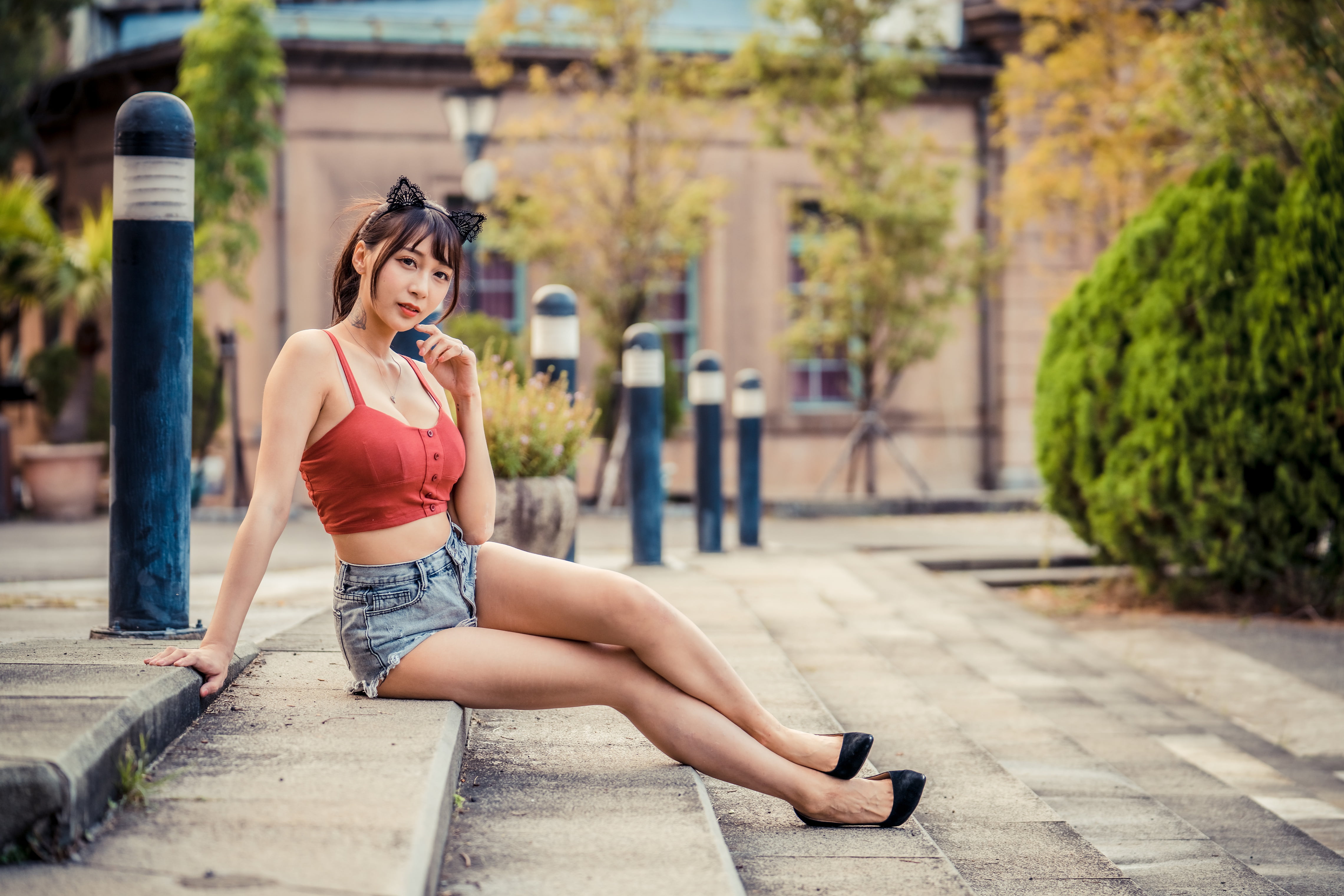 4K, long hair, red tops, Asian, model, jeans, tattoo, Bushes, shorts, stairs, depth of field, cat ears, sitting, house, necklace, hairband, brunette, trees, HD Wallpaper