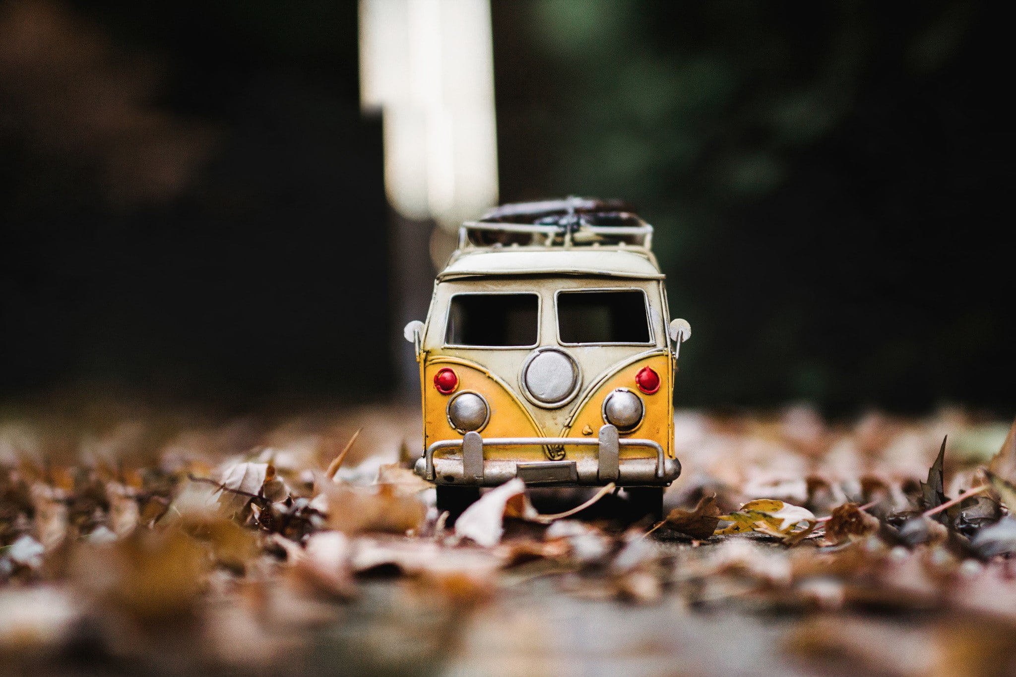 1080P, surface level, vw bus, car, toys, selective focus, Volkswagen combi, leaves, technology, close-up, no people, small, field, toy, outdoors, day, HD Wallpaper