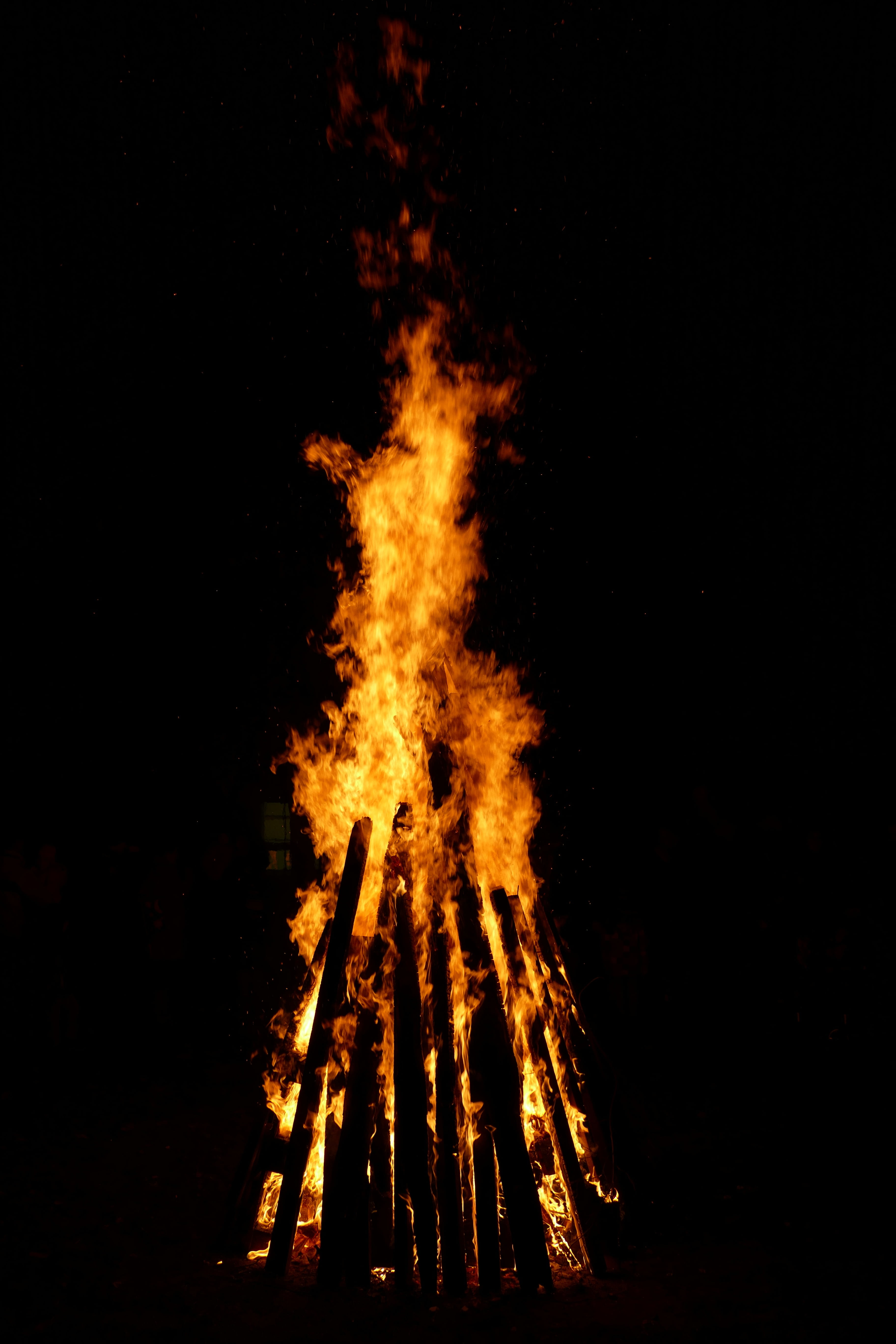 outdoors, heat - temperature, st martin, wood - material, yellow, sky, heat, campfire, bonfire, event, black background, glowing, smoke - physical structure, Phone HD Wallpaper
