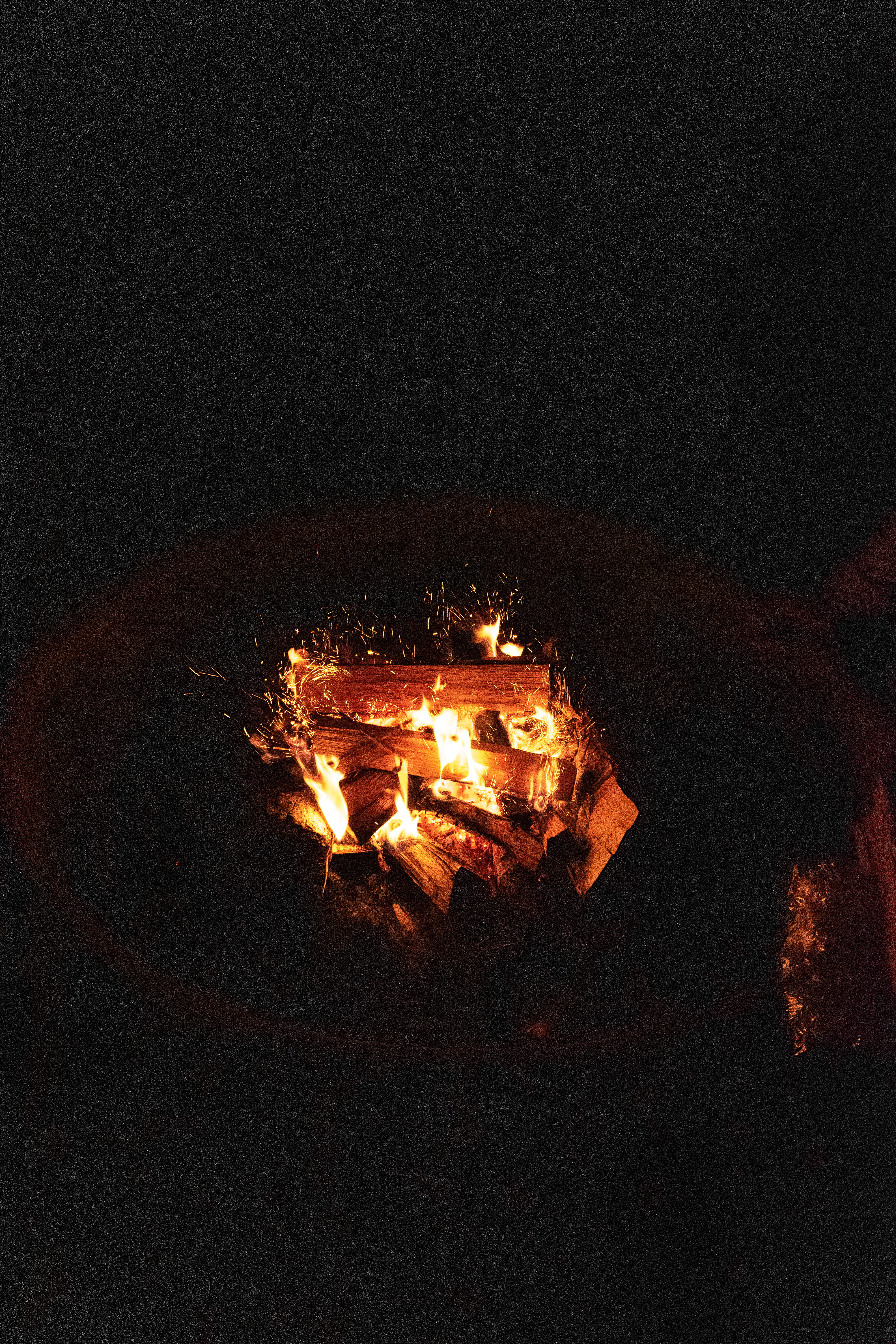 nature, firewood, hearth, sparks, outdoors, environment, flame, night, fire pit, red, outdoor, bright, glass, firepit, logs, burning, fireplace, dark, bonfire, Phone HD Wallpaper