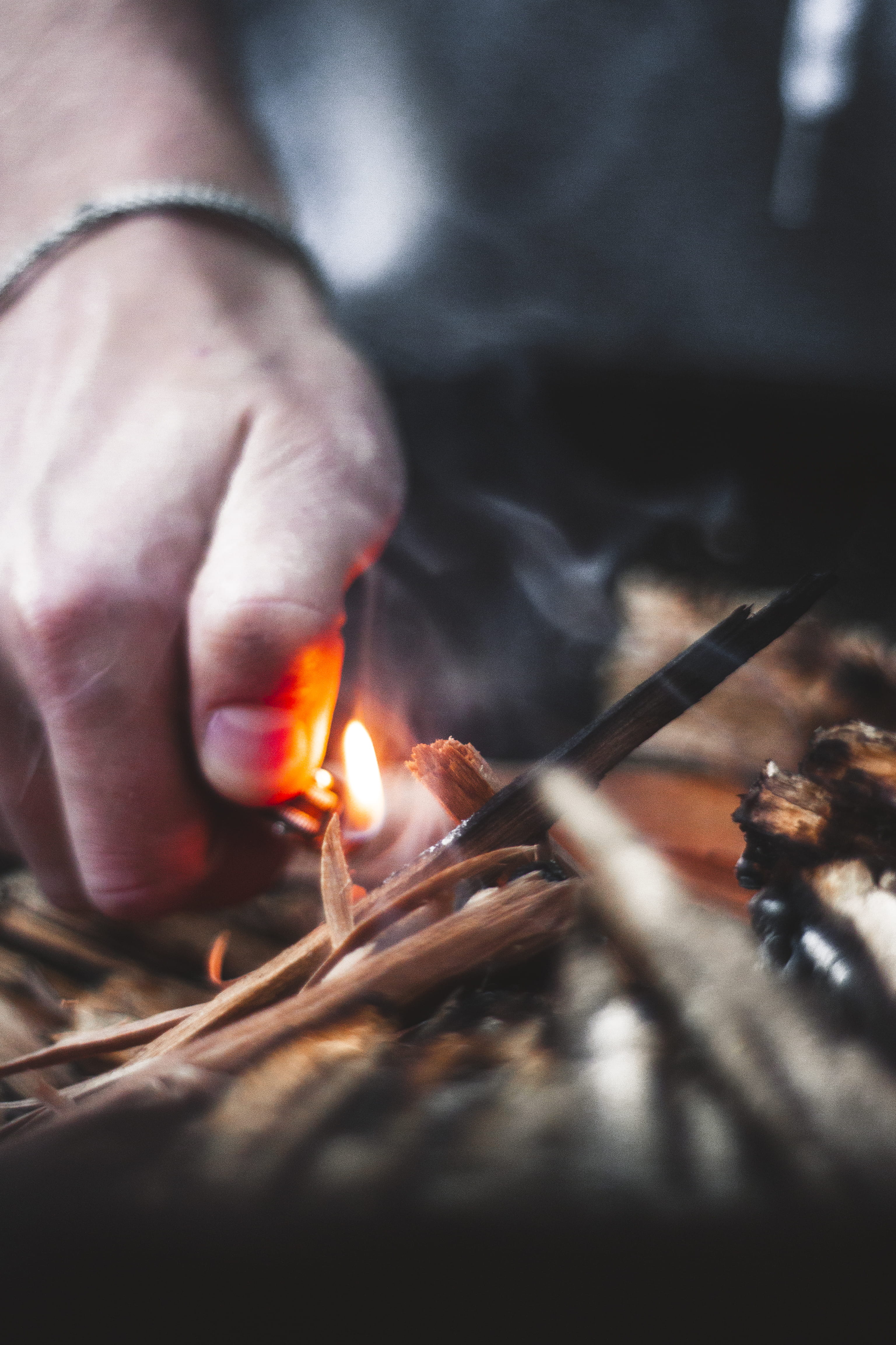 holding, human hand, finger, real people, selective focus, campfire, bonfire, bbq, burning, hand, men, blurred motion, heat - temperature, person, glowing, Phone HD Wallpaper