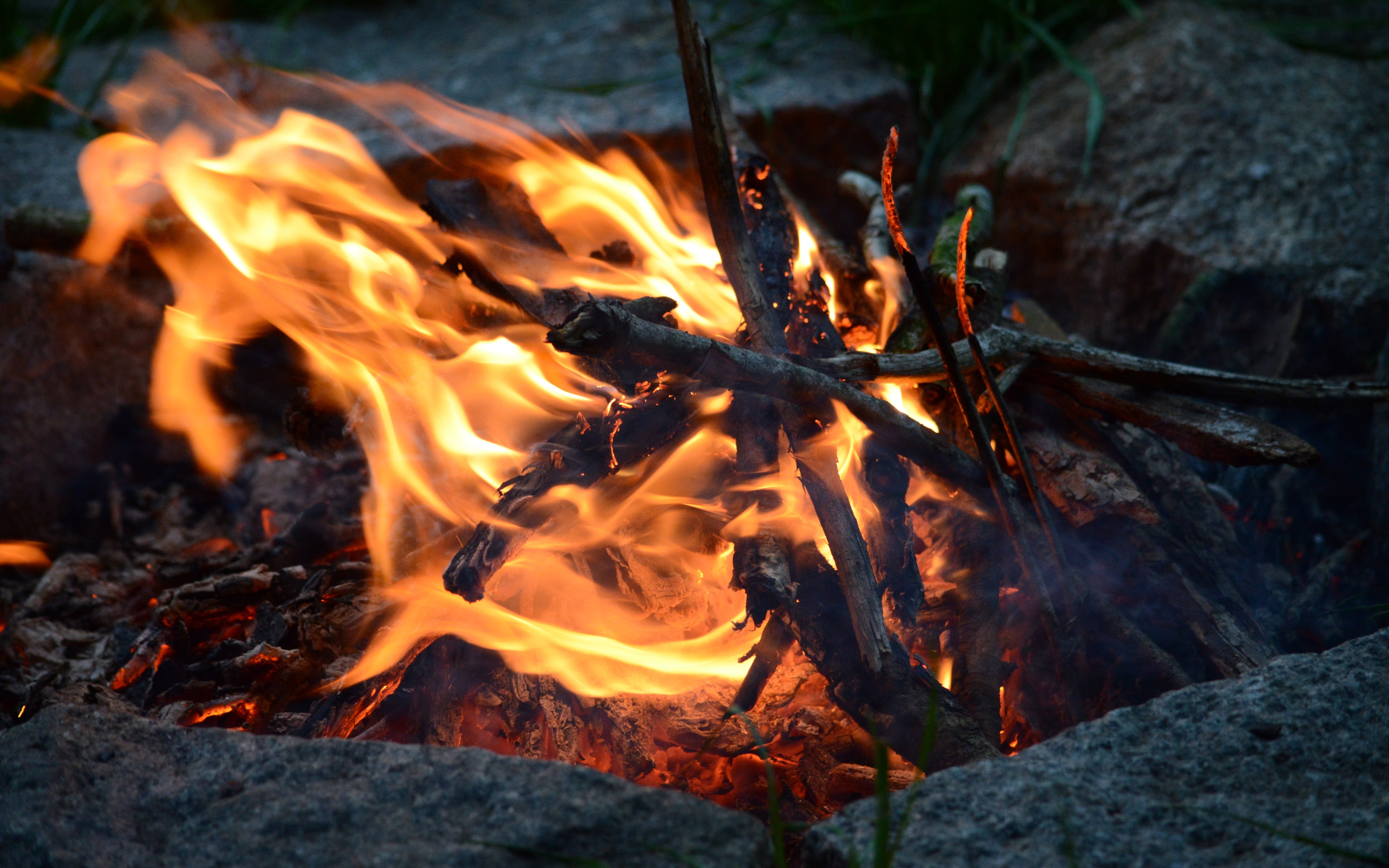 no people, nature, long exposure, flame, outdoors, firewood, motion, bonfire, rock, close-up, wood, fire, camping, 5K, burning, campfire, heat - temperature, HD Wallpaper