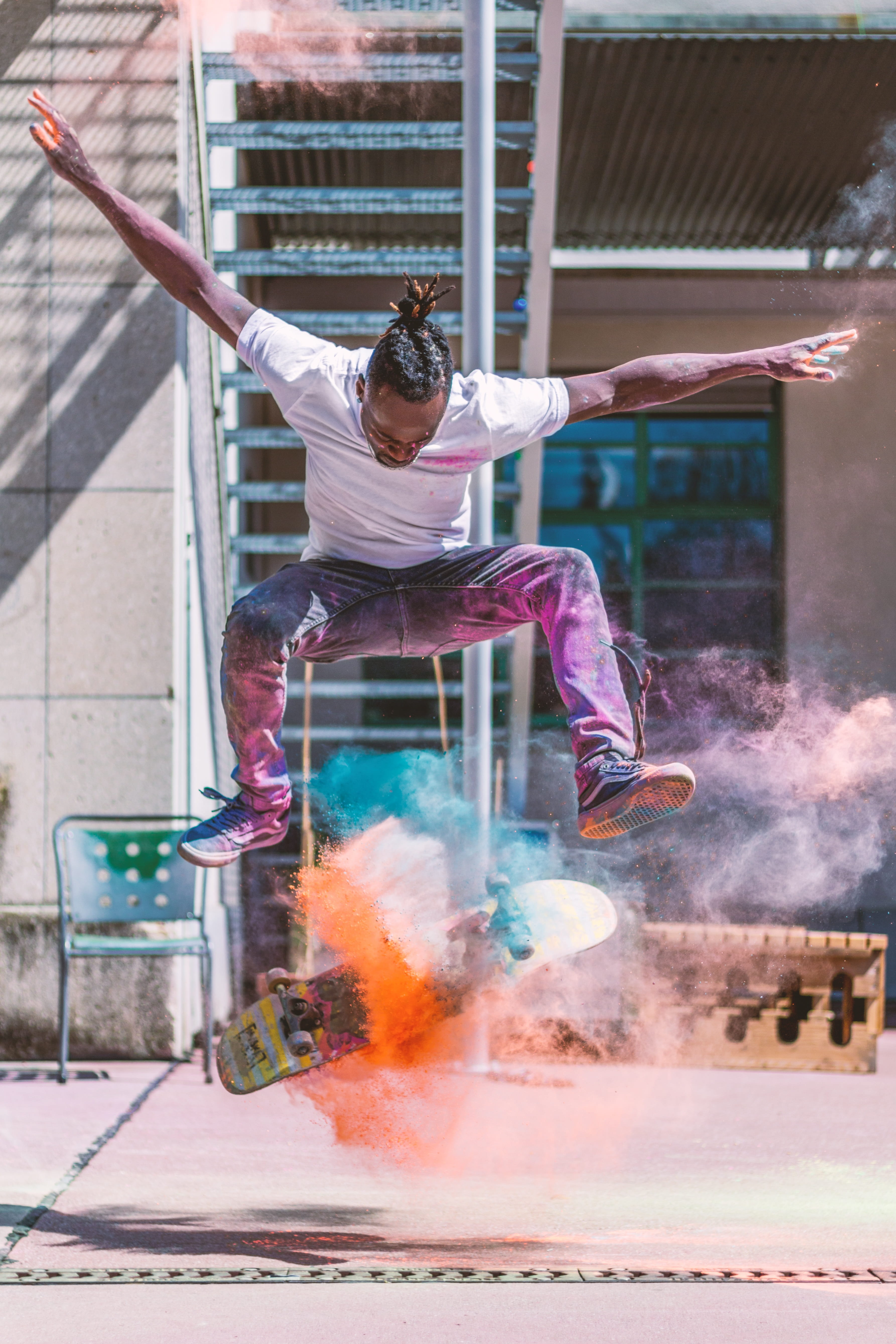 leisure, concentration, building exterior, adult, skateboarding, portrait, male, balancing, human, human arm, skating, fun, light, full length, jump shot, Phone HD Wallpaper
