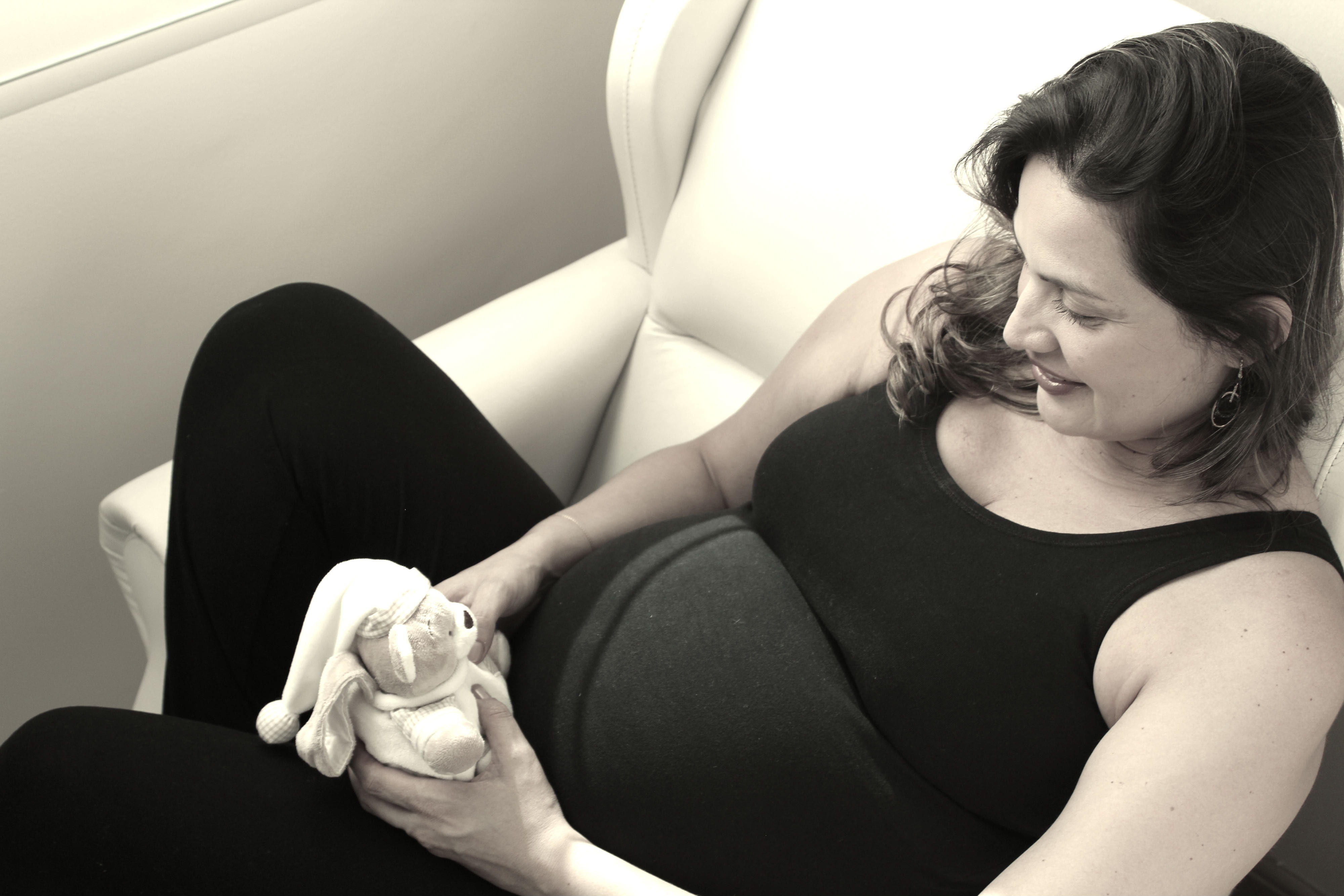 looking, baby, women, pregnant, holding, one person, bear, black color, 4K, lifestyles, three quarter length, mother, sofa, young adult, real people, pregnancy, HD Wallpaper