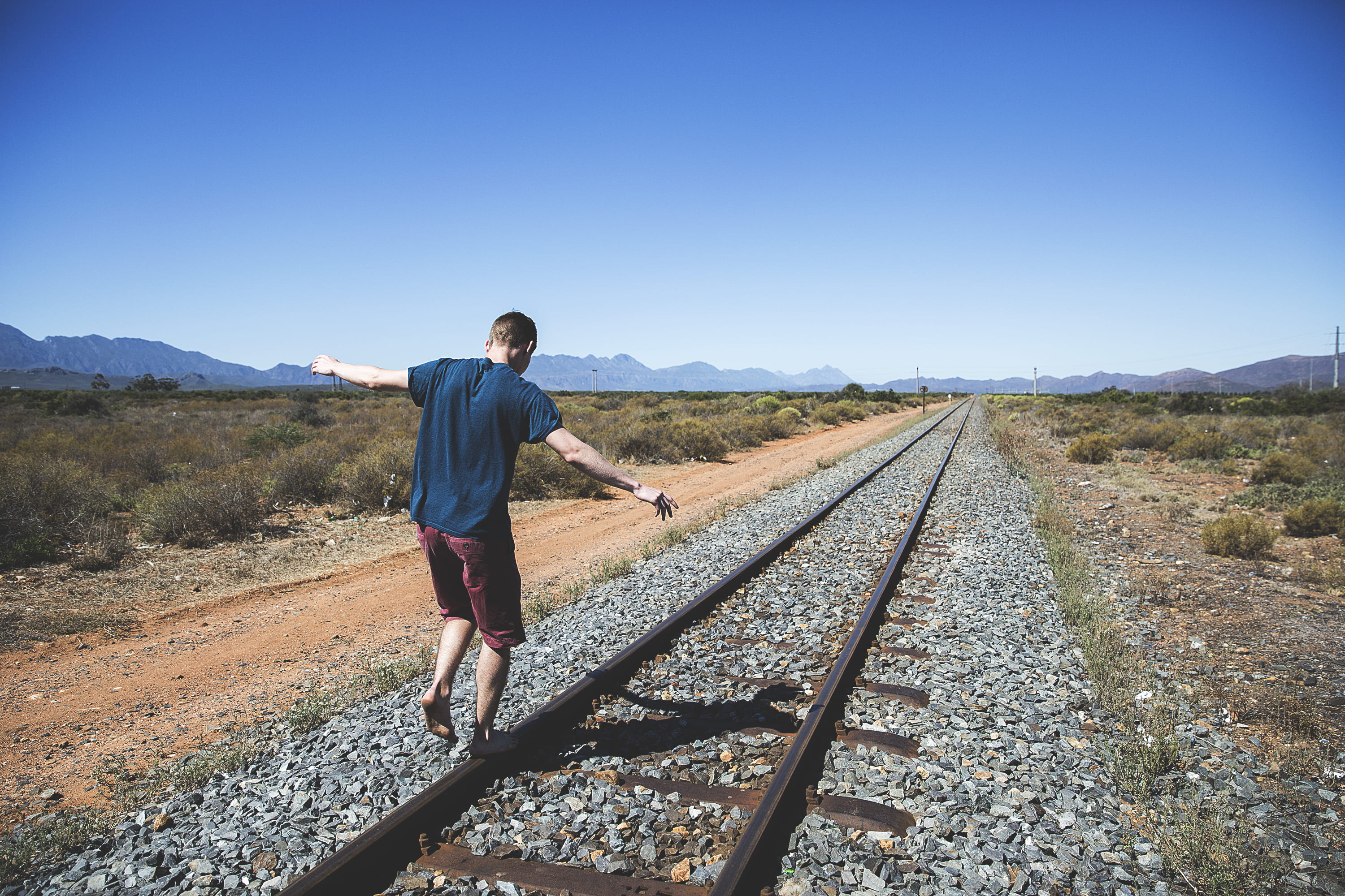 rail, adults only, one Person, blue, railings, sunny, rail transportation, one man only, males, day, nature, sky, full length, balancing, sunlight, 2K, HD Wallpaper