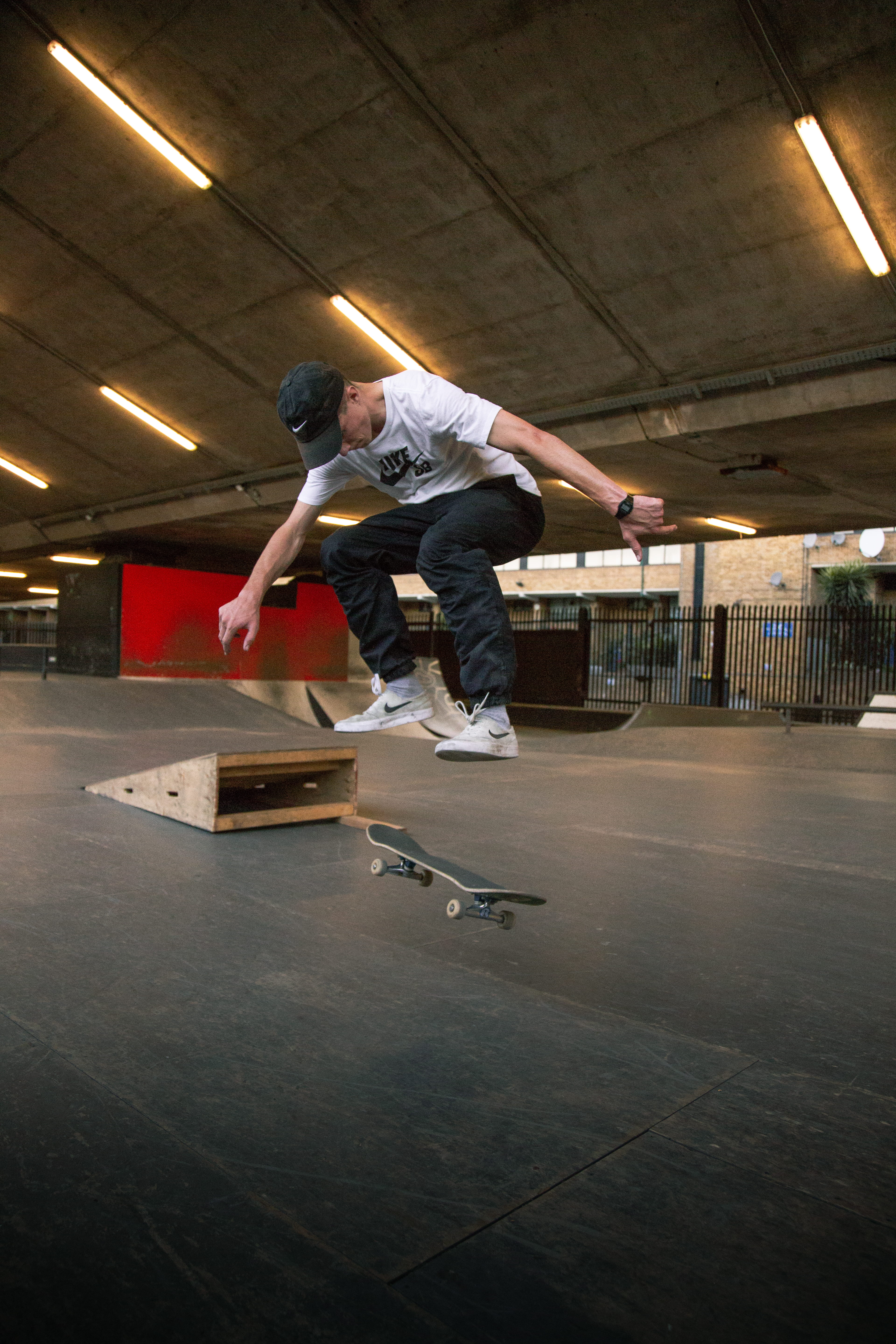 man, skater, concrete, sport, playing, trick, jumping, ramp, indoors, ceiling, t, real people, tricks, balance, young, white, lifestyles, jump, illuminated, Phone HD Wallpaper