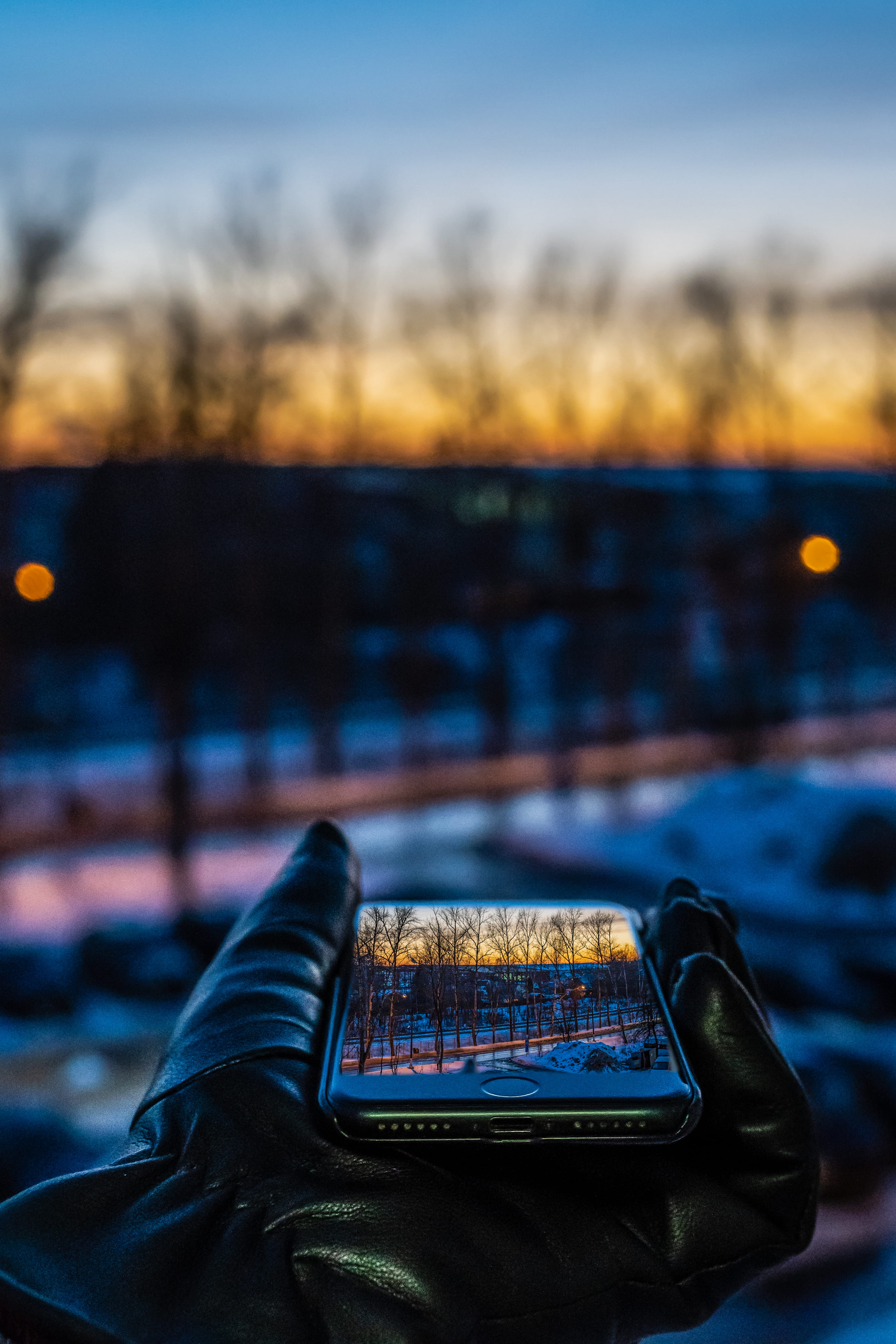 technology, communication, human body part, mobile phone, activity, phone, sunset, lighting, water, real people, bokeh, hand, glove, person, cell phone, Phone HD Wallpaper