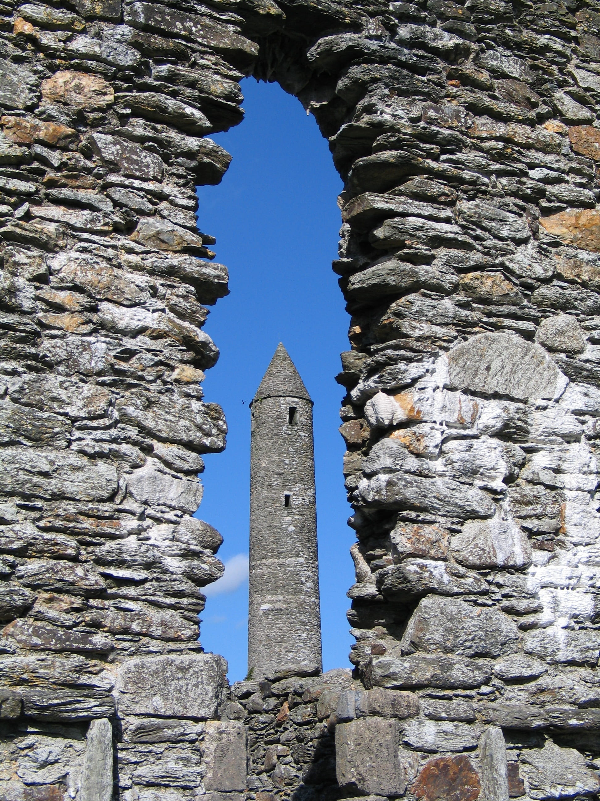 low angle view, ancient, outdoors, history, sunlight, monastery, glendalough, built structure, old ruin, solid, day, ancient civilization, stone wall, clear sky, Phone HD Wallpaper