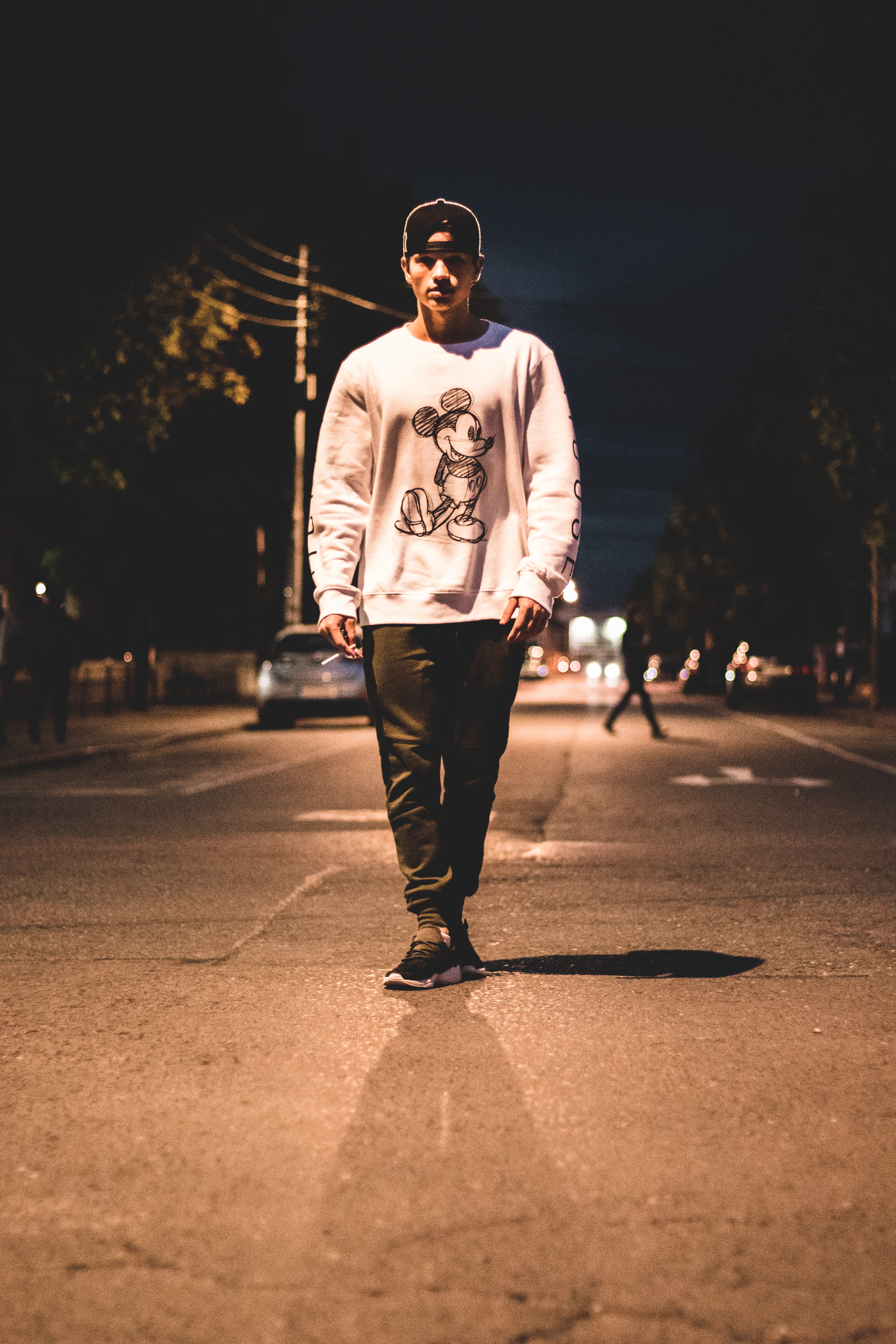 undershirt, focus on foreground, nighttime, human, leisure activity, walking, leisure activities, incidental people, ireland, middle, looking at camera, Phone HD Wallpaper