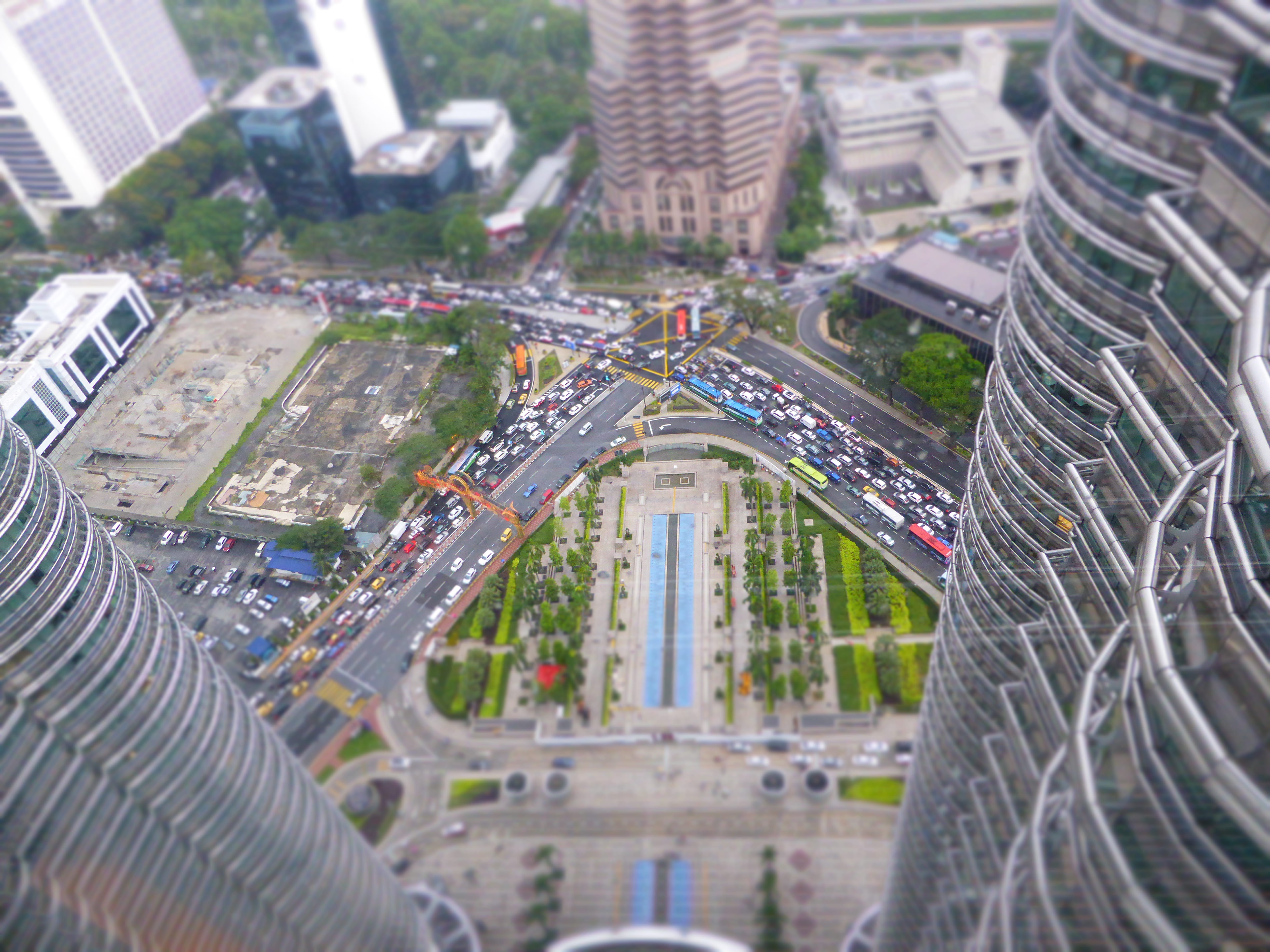 outdoors, high angle view, modern, cityscape, built structure, skyscraper, malaysia, traffic, nature, petronas towers, mode of transportation, financial district, HD Wallpaper