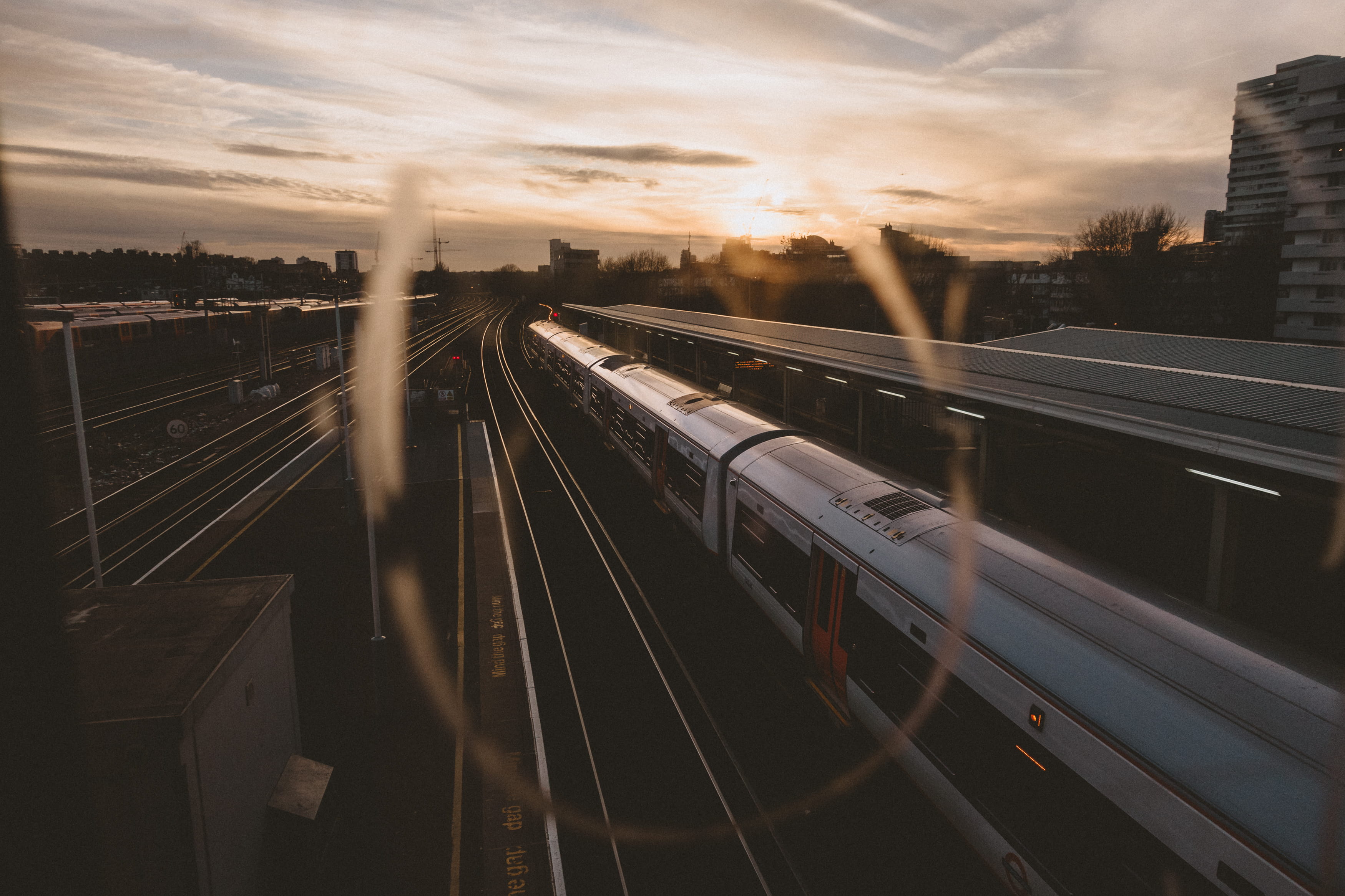 on the move, railroad track, city, clapham junction, orange, no people, travel, transportation, london, sunset, subway train, transport, window, multiple lane highway, HD Wallpaper