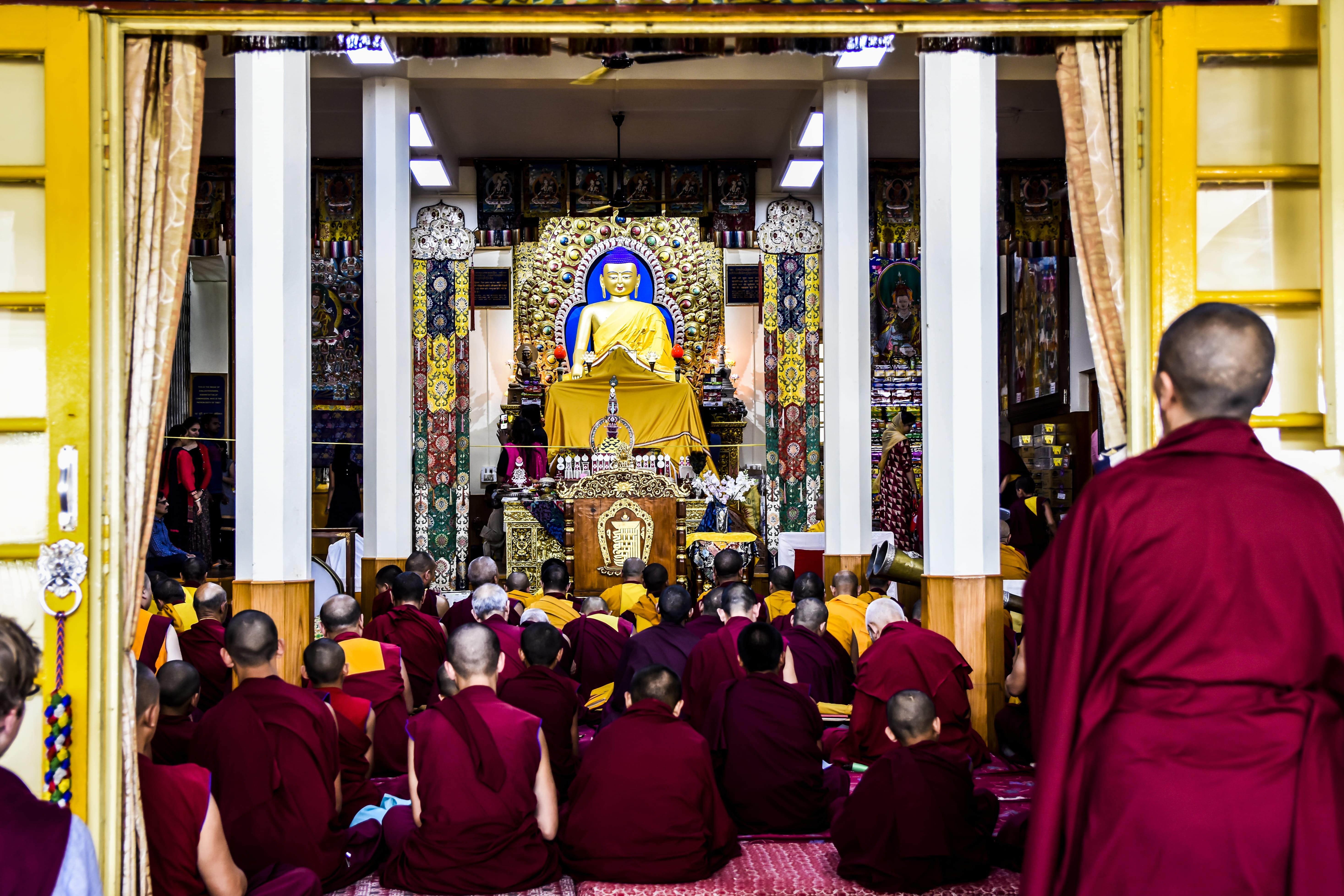 crowd, people, prayer, buddha, worls, worship, red, art, yellow, real people, lifestyles, human representation, place of worship, 5K, human, sitting, group of people, HD Wallpaper