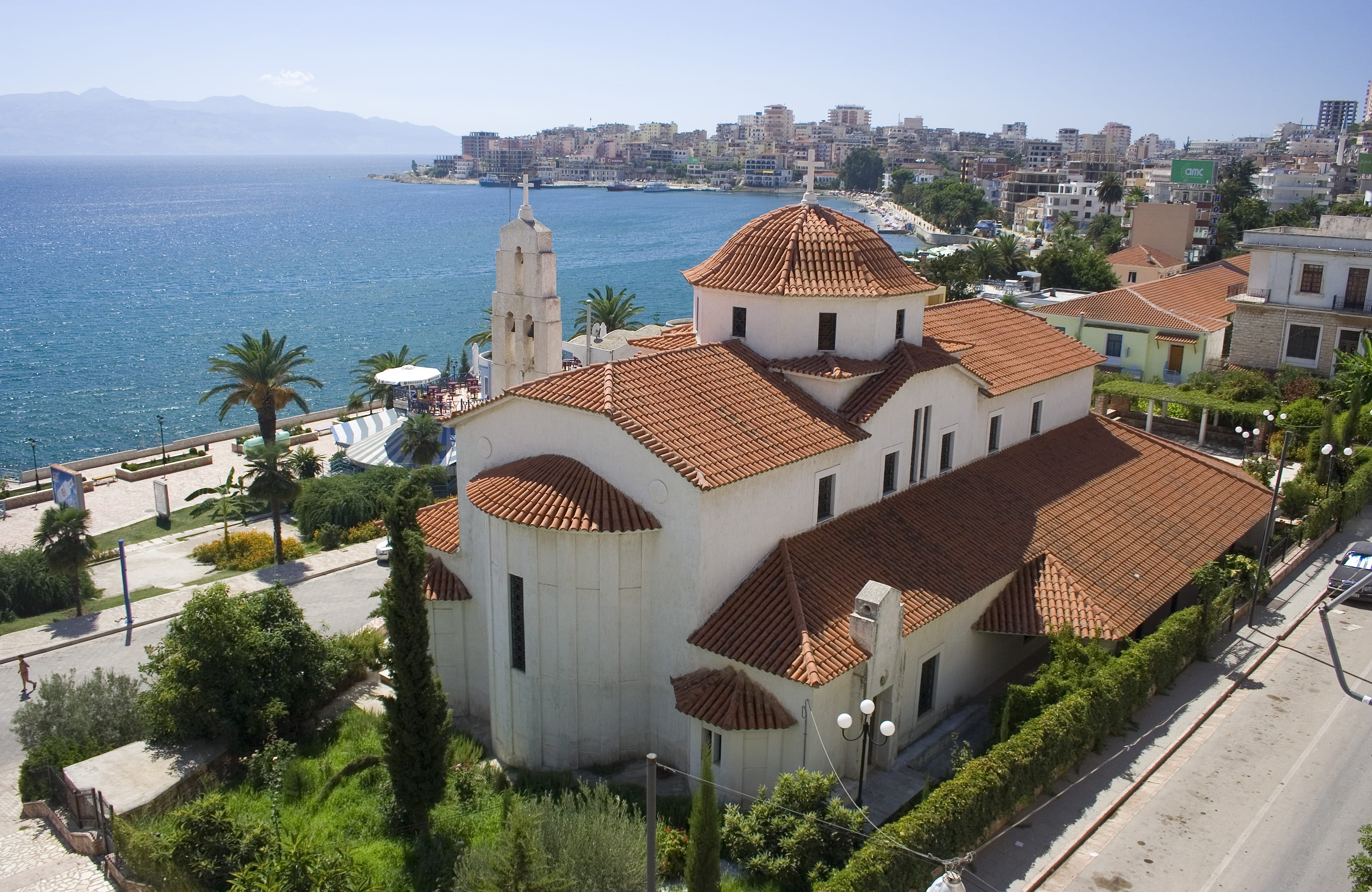 city, architecture, Albania, outdoors, town, holiday, nature, water, Beach, cathedral, sky, residential district, building, tree, hot, sunlight, roof, house, HD Wallpaper