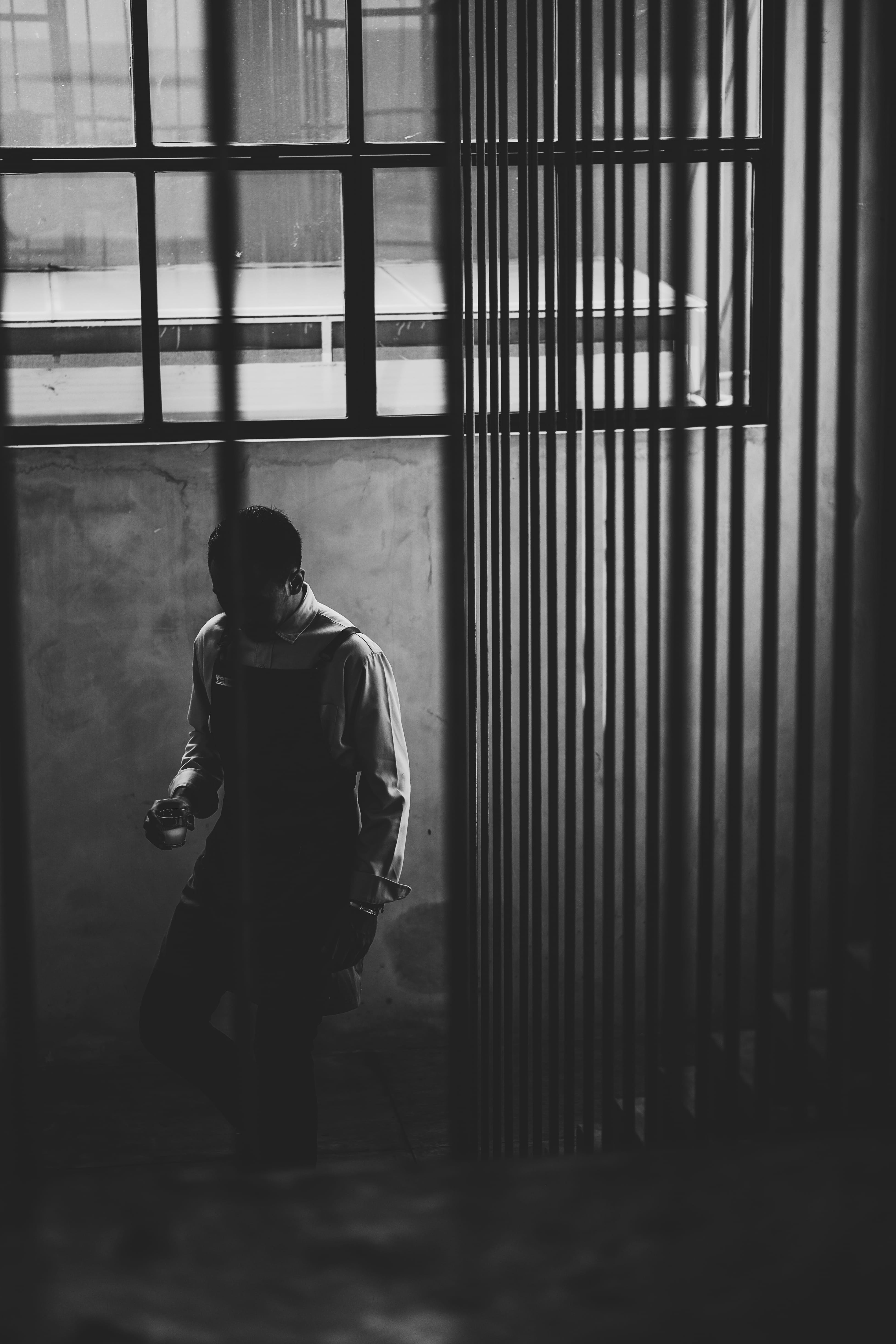 walking, standing, near, casual clothing, black And White, solitude, men, day, photo, lifestyles, loneliness, indoors, one Person, leisure activity, stair, Phone HD Wallpaper