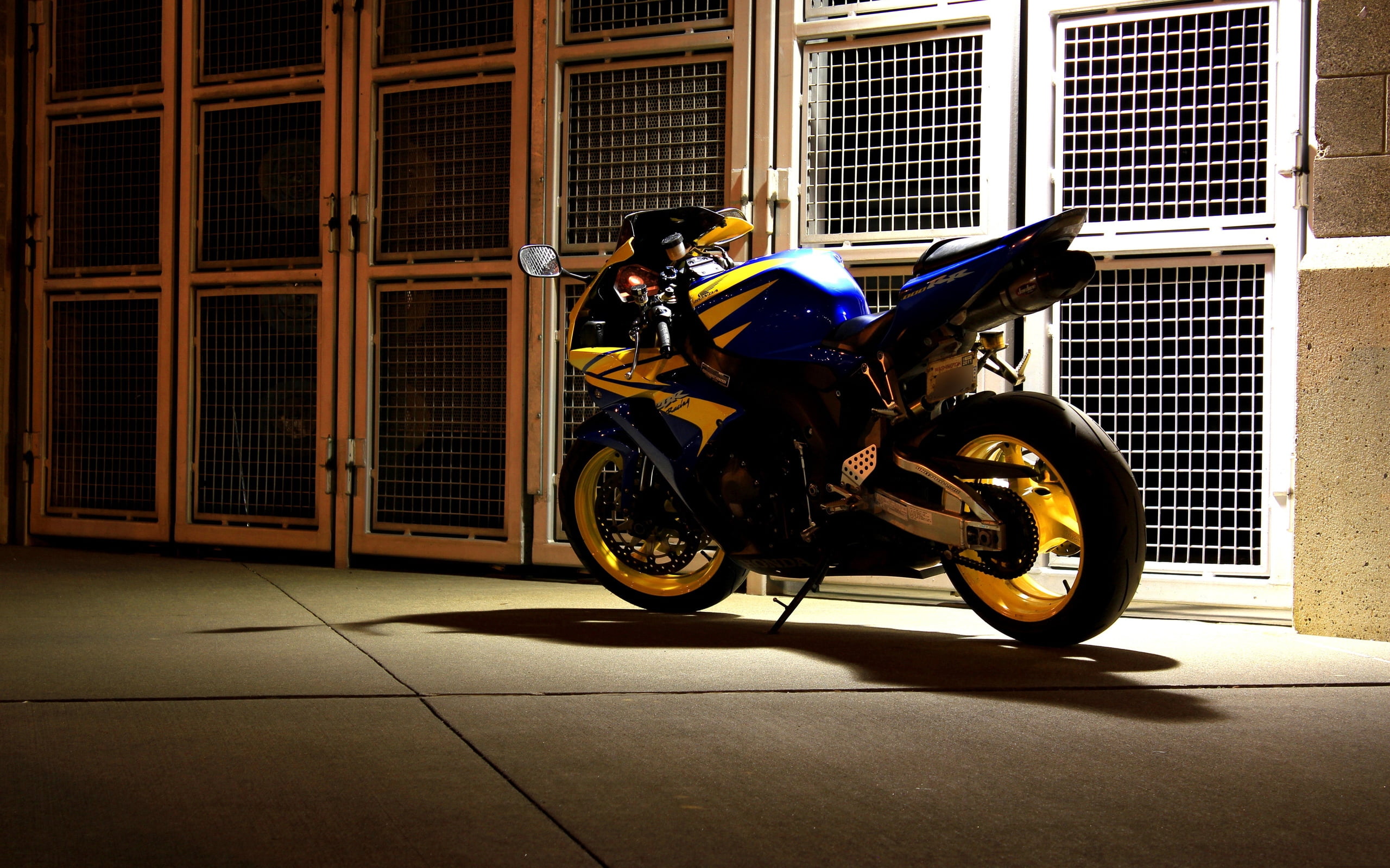 full length, sports, building exterior, editorial, night, street, tiled floor, yellow, motorcycle, blue, helmet, land Vehicle, built structure, side view, HD Wallpaper