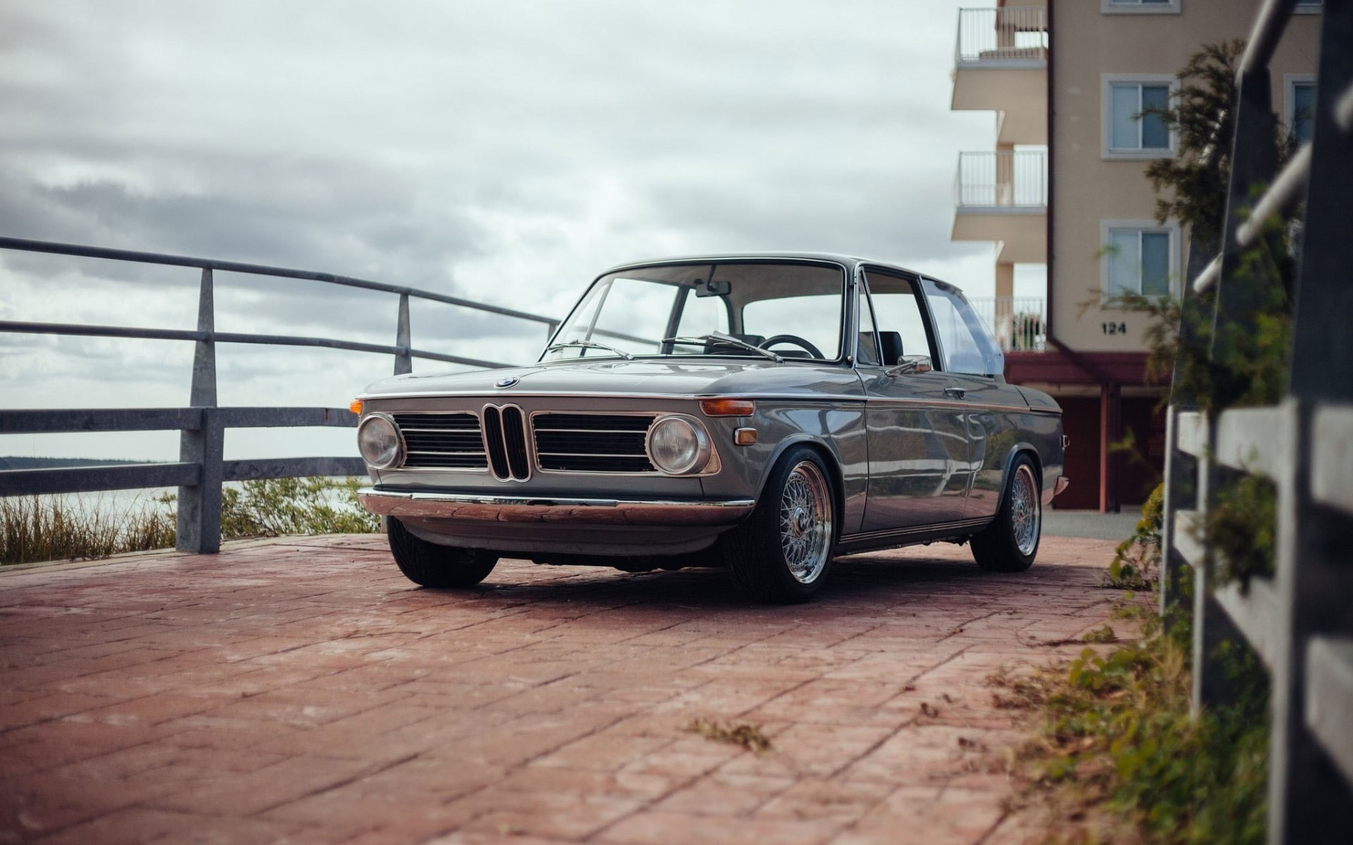 day, luxury, outdoors, classic car, BMW 2002, no people, selective focus, car, connection, BMW, transportation, water, road, railing, sky, motor vehicle, HD Wallpaper