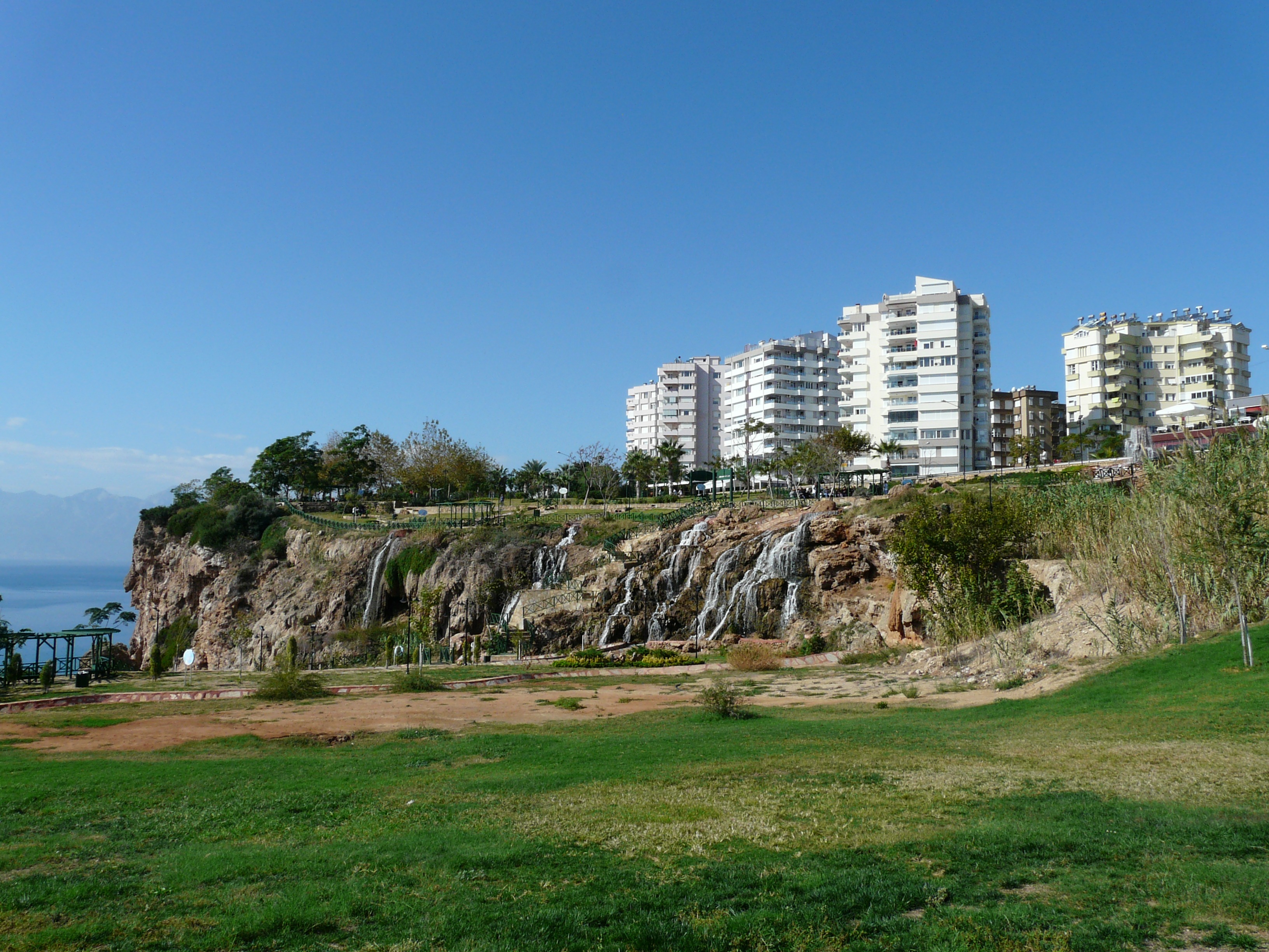 day, plant, building exterior, 2K, city, holiday, building, rock, park, architecture, clear sky, built structure, copy space, nature, turkey, waterfall, HD Wallpaper