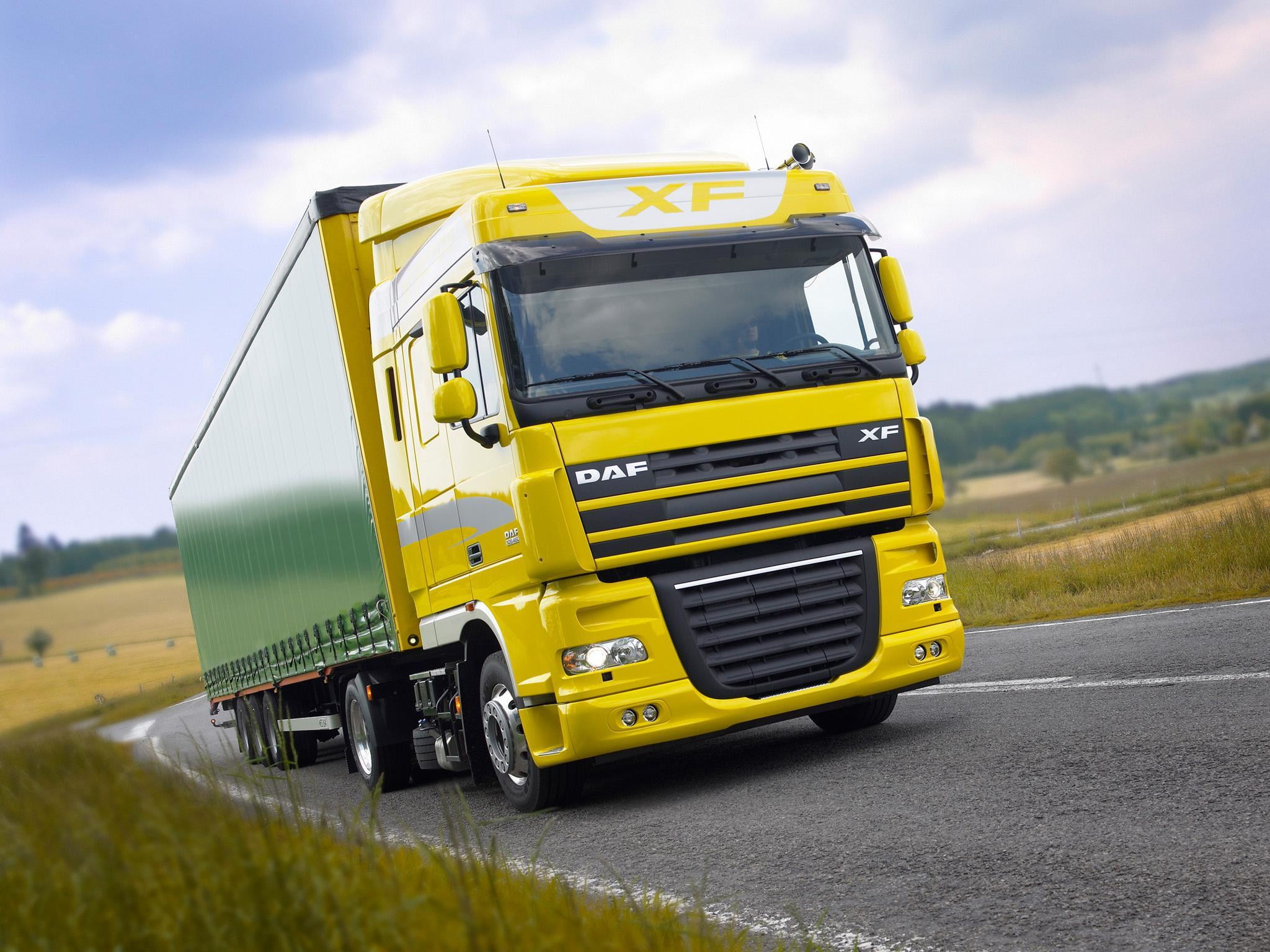 land, Truck, car, mode of Transport, trucking, no People, sky, shipping, nature, landscape, day, business, highway, machinery, driving, motion, yellow, HD Wallpaper
