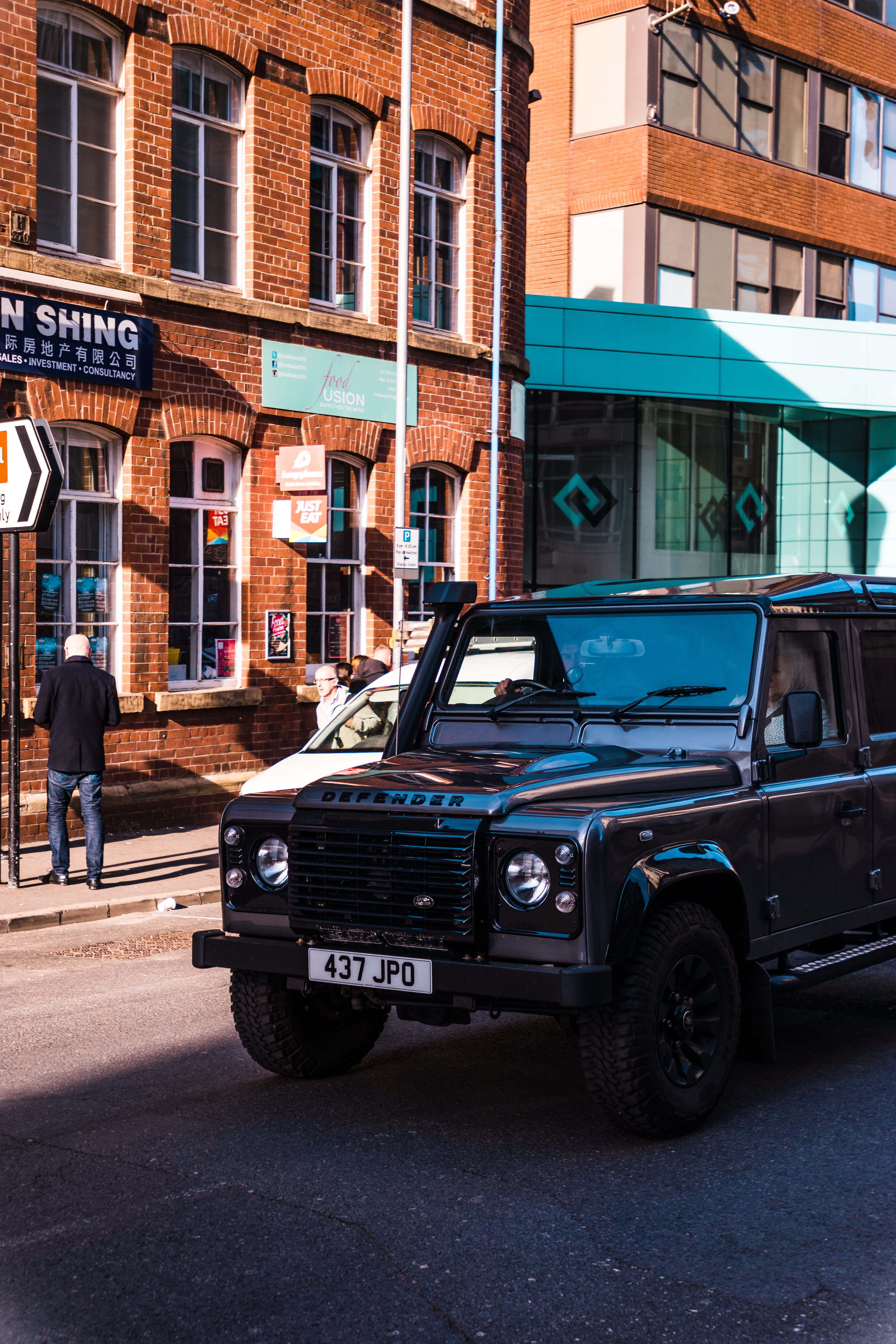 near, alloy wheel, city, building exterior, truck, car, street, vehicle, residential district, wheel, 5K, human, jeep, range rover, daytime, real people, Phone HD Wallpaper