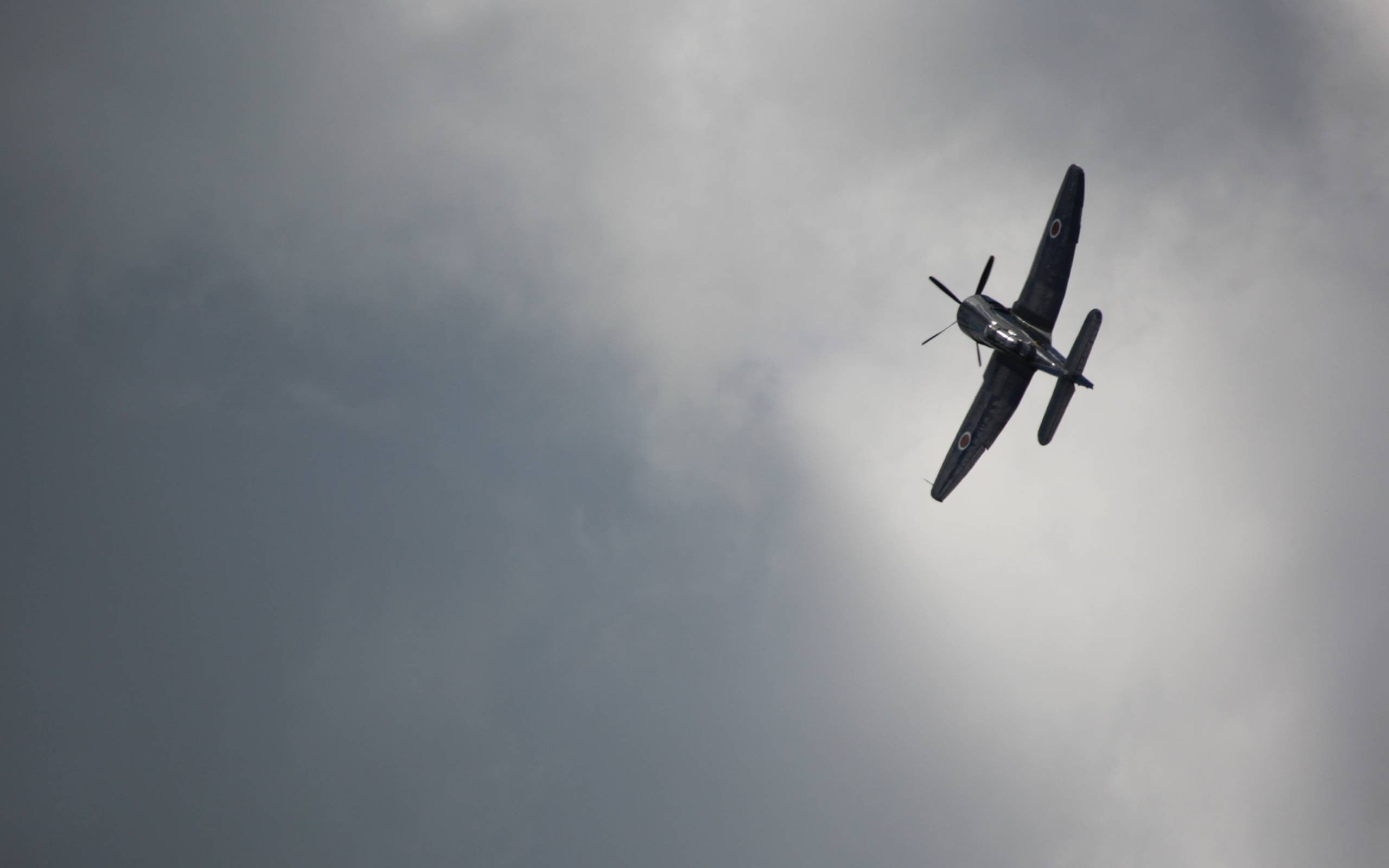 air vehicle, airplane, overcast, propeller, mid-air, silhouette, cloud - sky, directly below, low angle view, day, 2K, planes, on the move, aerobatics, HD Wallpaper