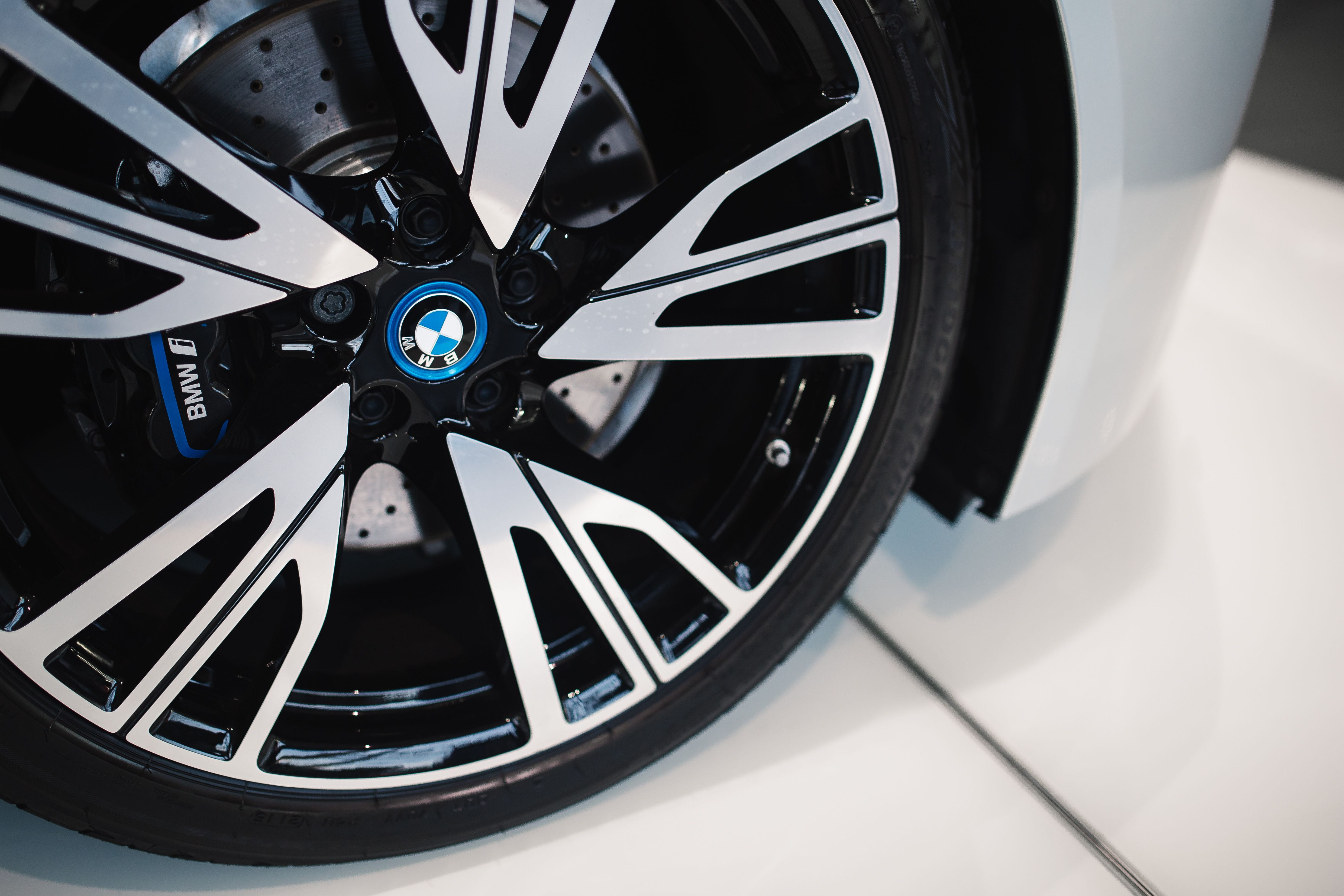 sports car, wheel, land Vehicle, focus on foreground, metal, Silver, shape, indoors, vehicle part, car, transportation, design, bmw, black Color, equipment, HD Wallpaper