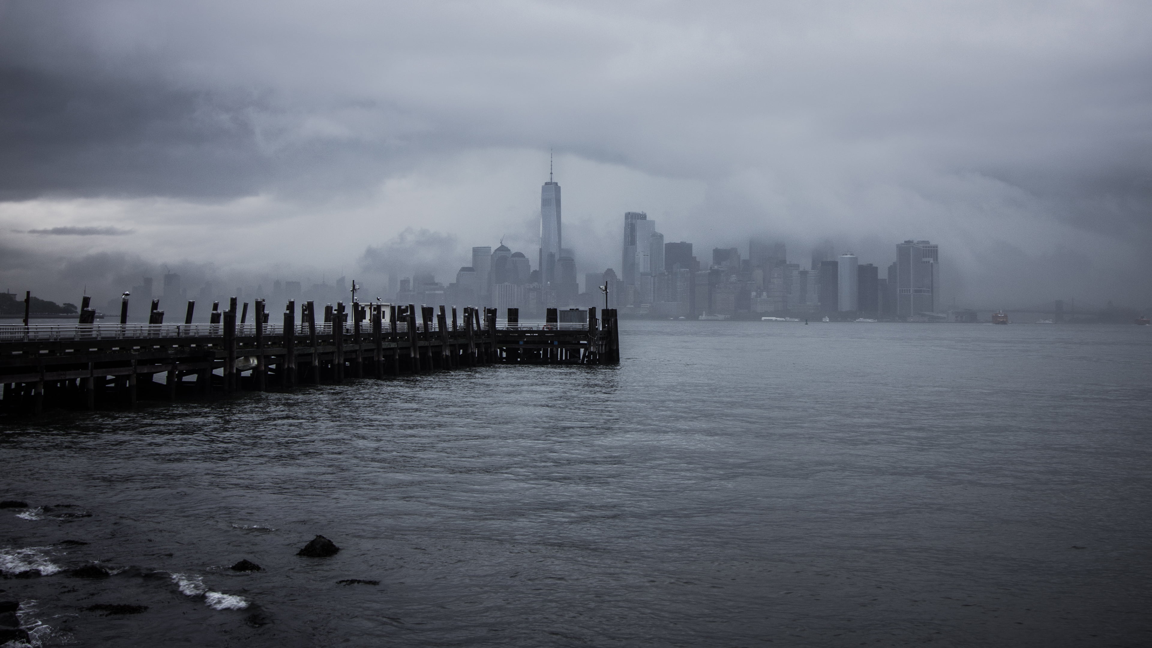 urban skyline, clouds, cityscape, coastline, sky, building, dom Tower, outdoors, modern, weather, water, USA, famous Place, cloudscape, sea, storm, cloud - Sky, HD Wallpaper