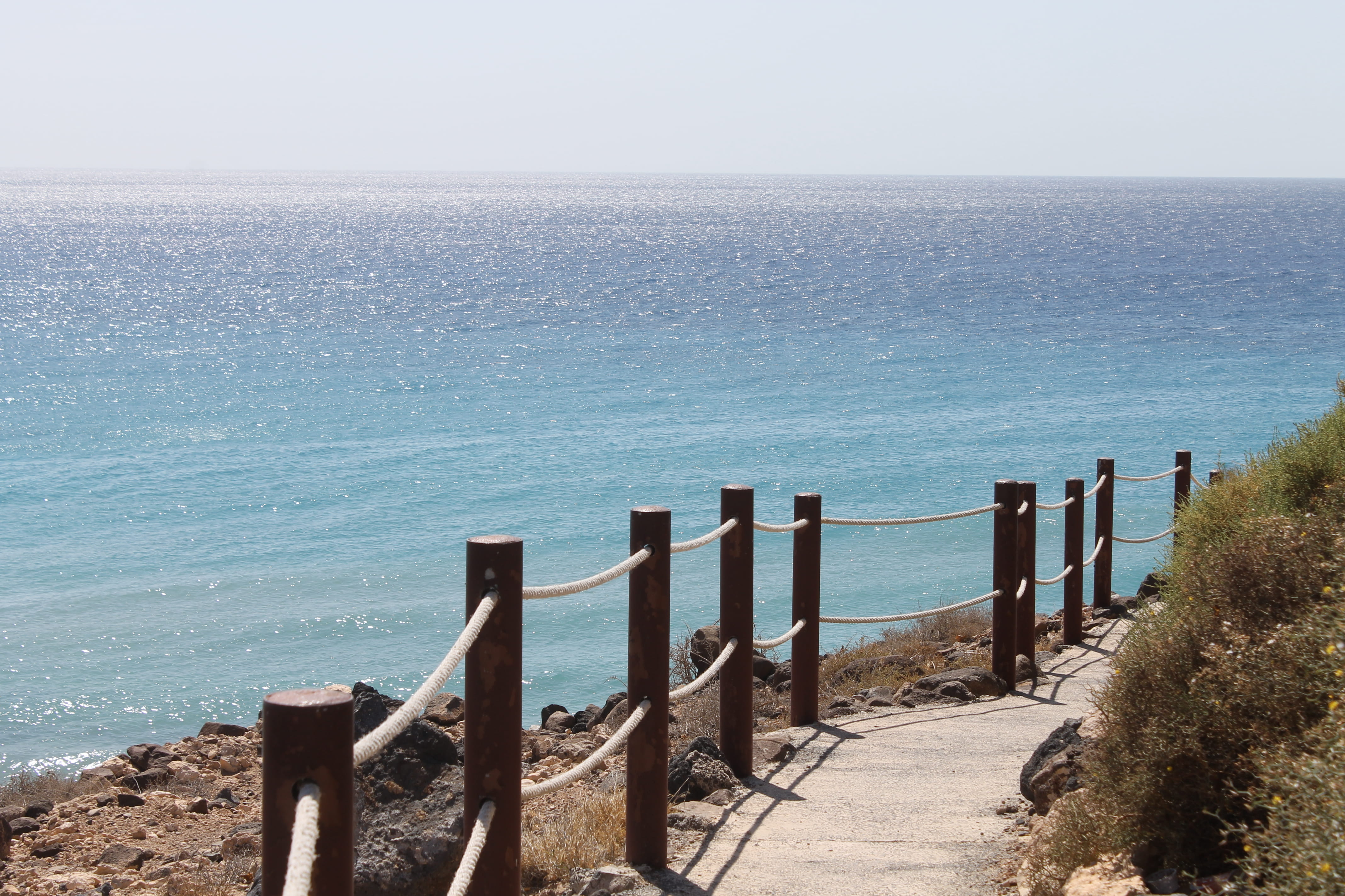 water, day, clear sky, scenics - nature, outdoors, idyllic, sea, sky, no people, railing, fuerteventura, land, horizon, tranquil scene, 4K, spain, nature, HD Wallpaper