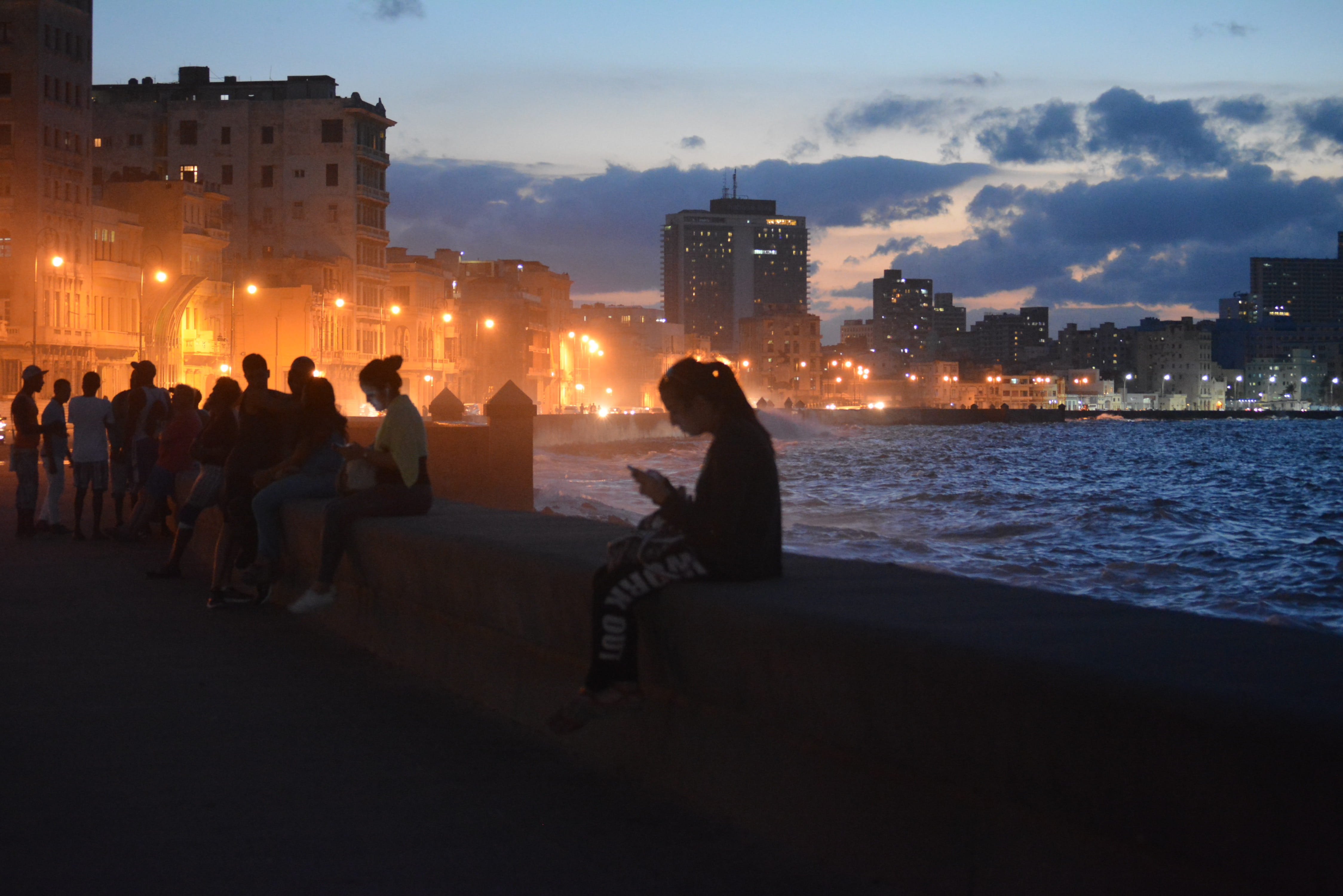 cloud - sky, leisure activity, women, 4K, water, built structure, building, city life, real people, malecon, nature, office building exterior, la habana, HD Wallpaper