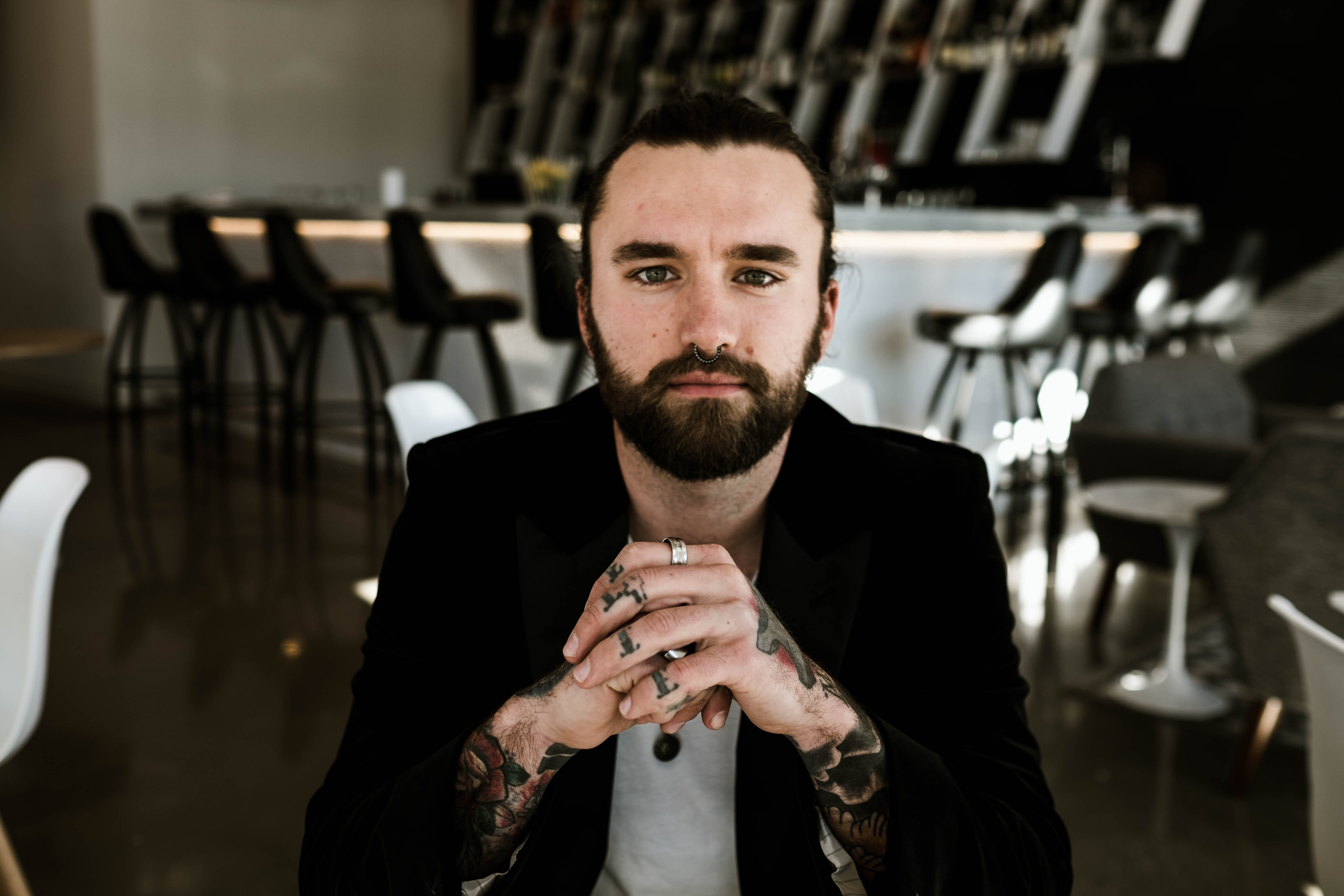 photo, portrait, facial hair, young adult, sitting, headshot, man, focus, caucasian, jacket, 4K, one person, wearing, men, man bun, focus on foreground, HD Wallpaper