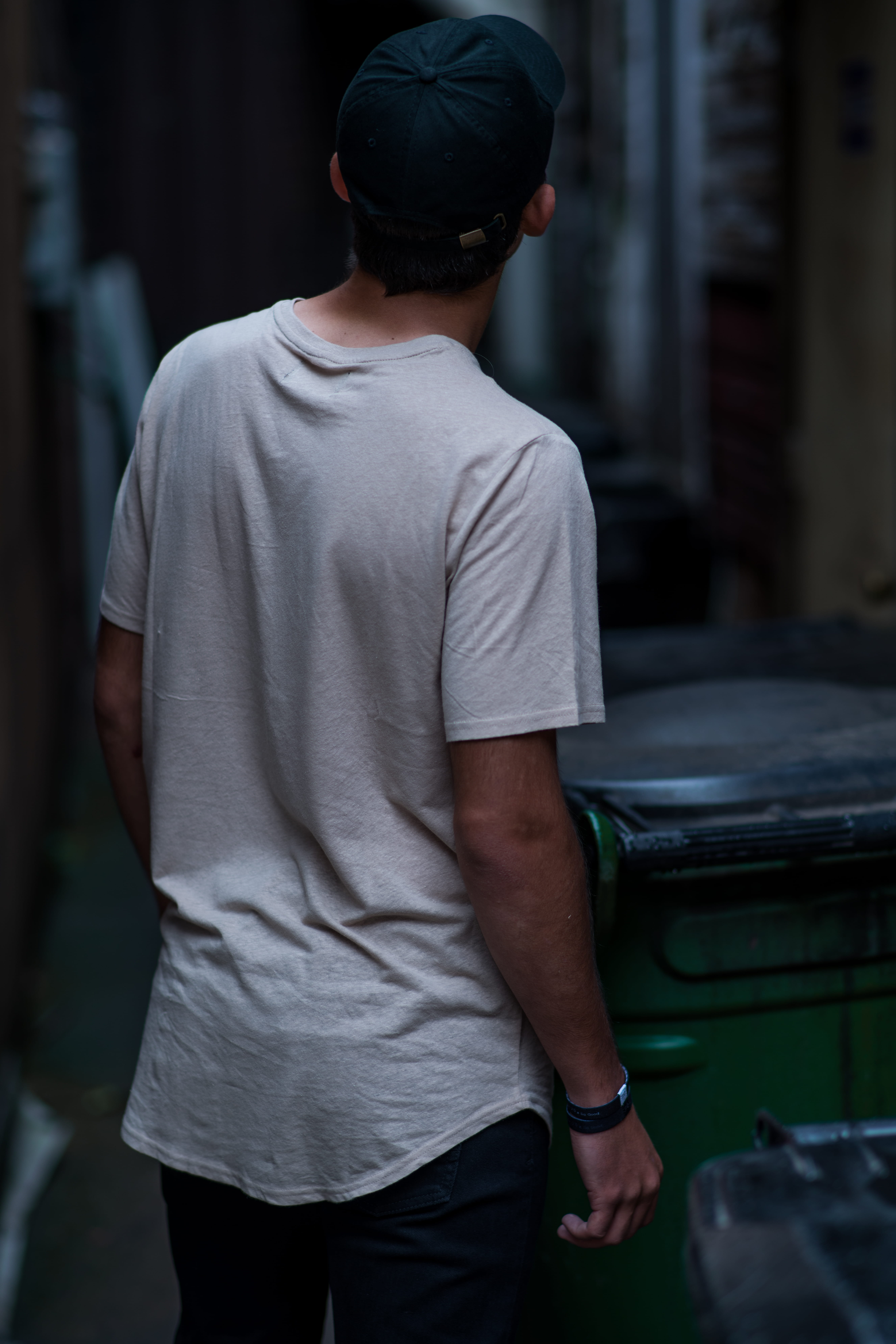beside, male, bin, street, white, wheelie, cap, man, hat, lifestyles, leisure activity, real people, day, wearing, t, outdoors, standing, men, rear view, Phone HD Wallpaper