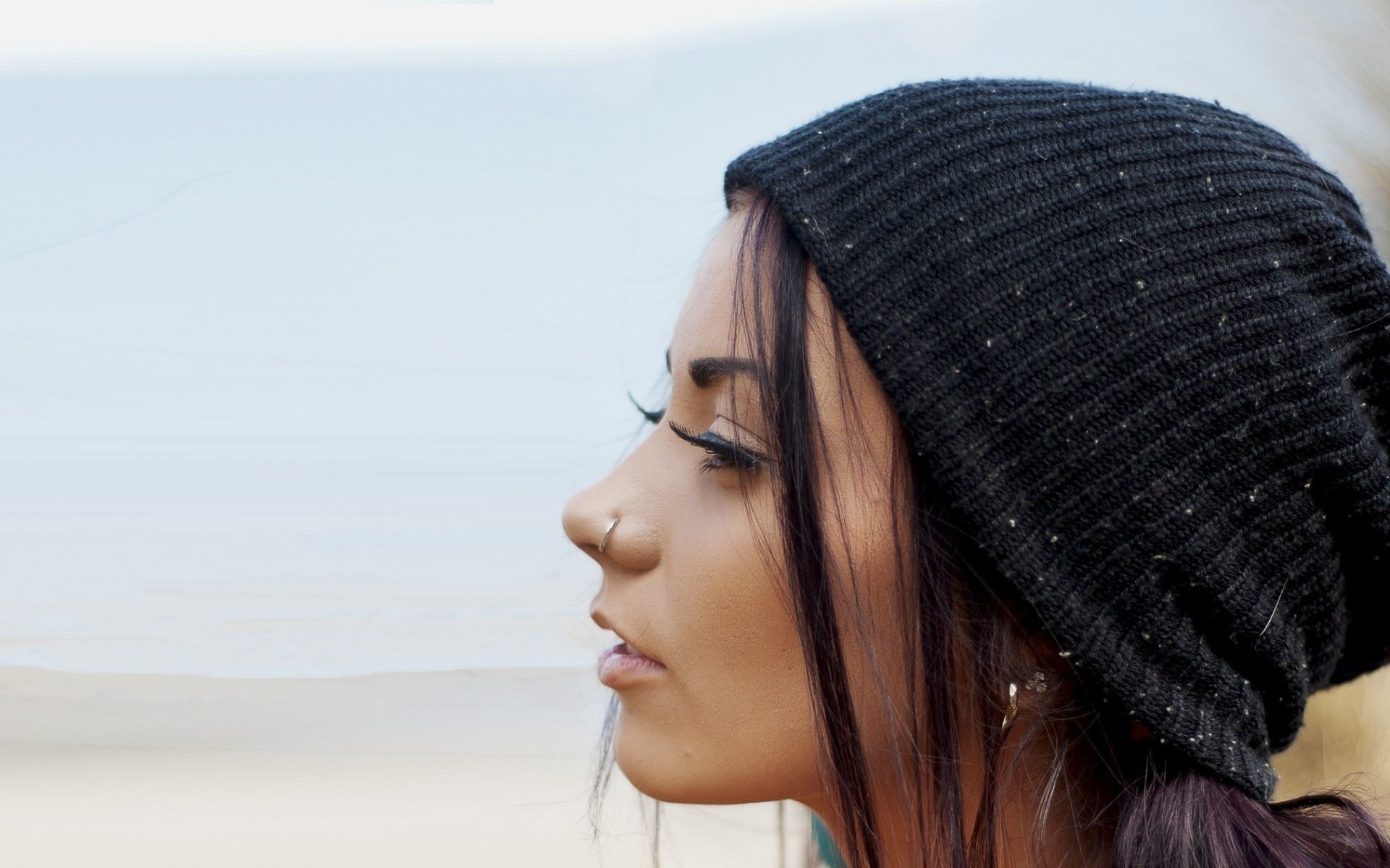 portrait, looking away, lifestyles, piercing, hair, outdoors, brunette, face, hairstyle, nose rings, day, women, 1080P, looking, focus on foreground, hat, HD Wallpaper