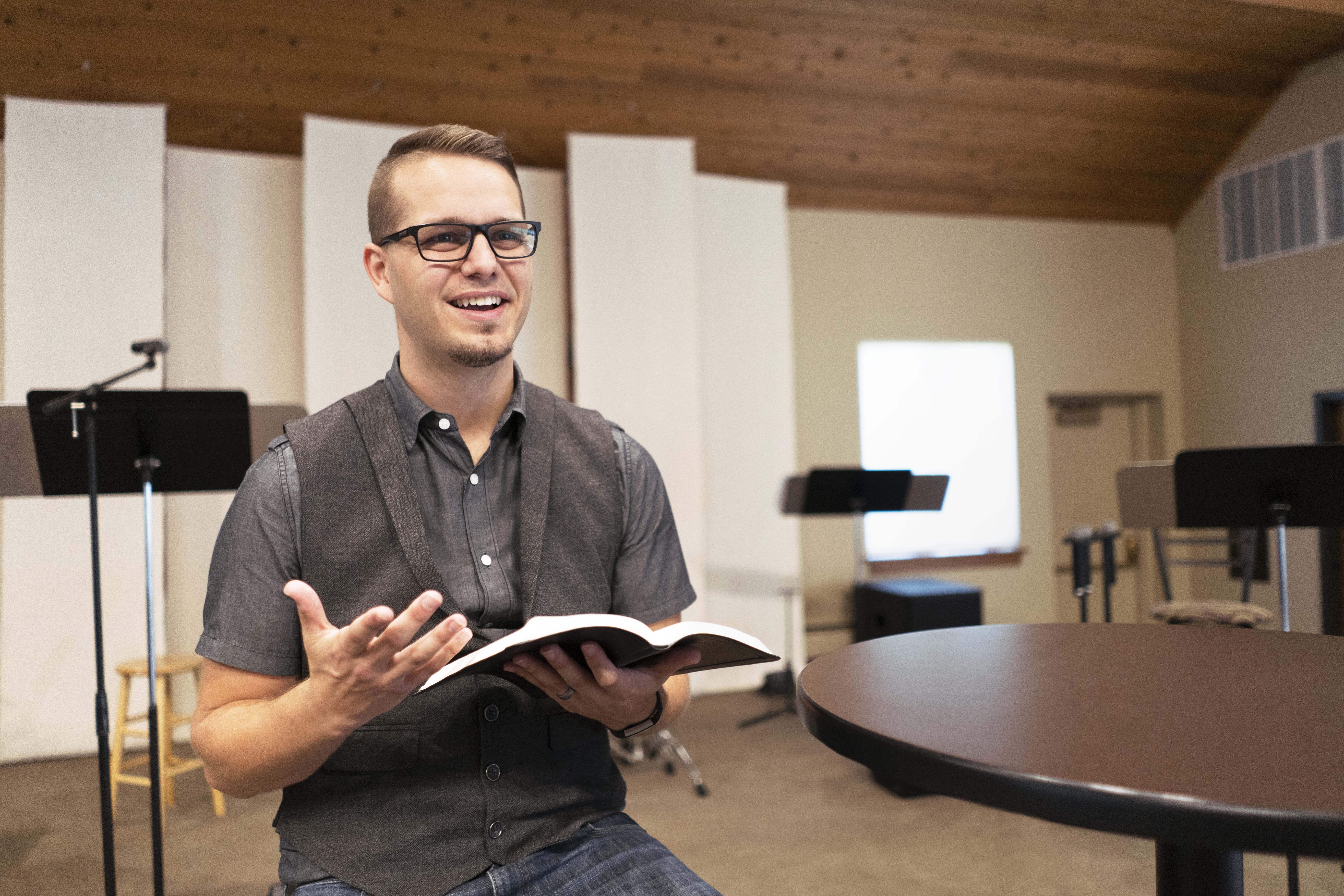 young men, eyeglasses, paperwork, looking at camera, glasses, front view, bible, business, communication, preaching, three quarter length, focus on foreground, HD Wallpaper