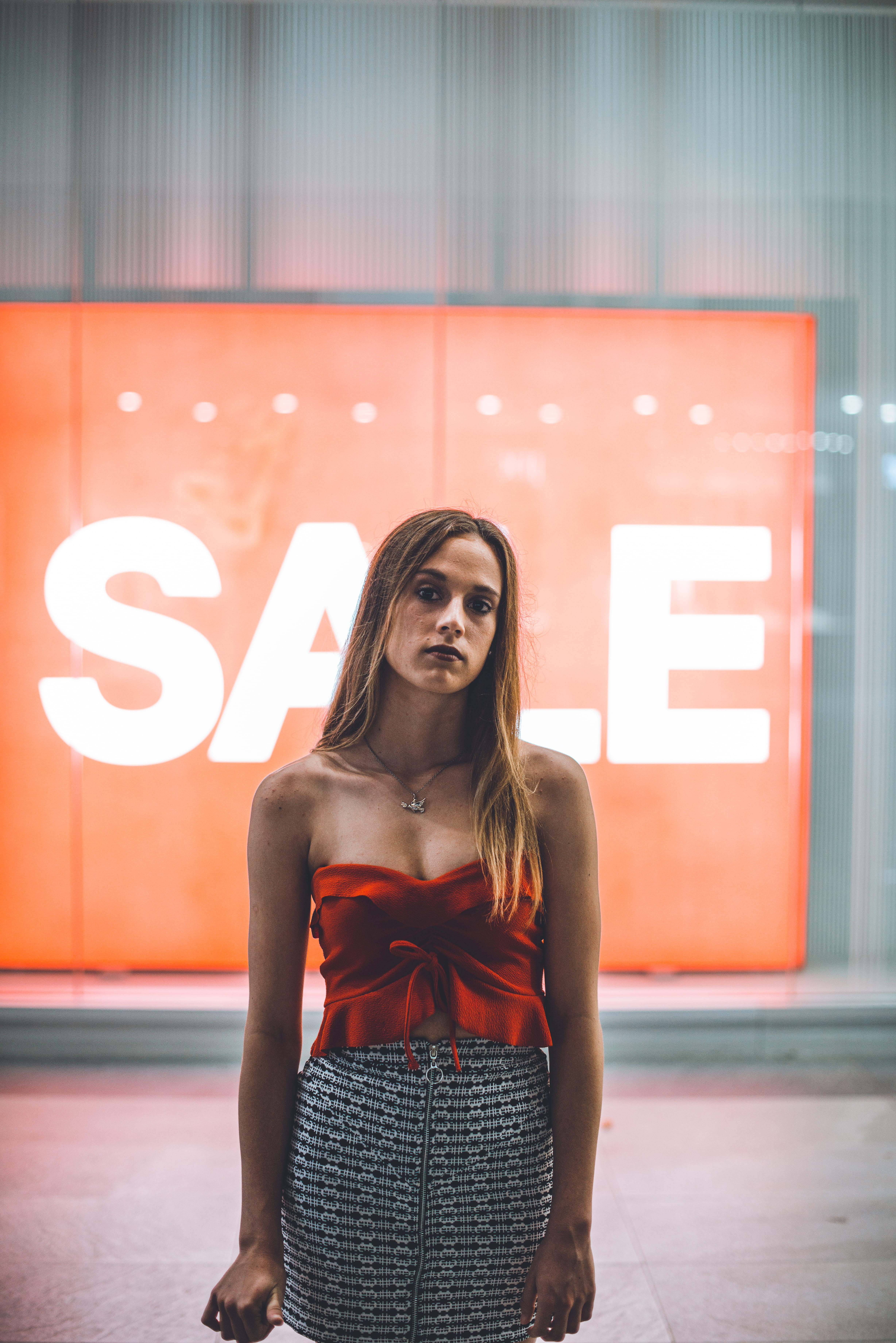 one person, red, skirt, lights, women, pose, lady, human, real people, gray, youth, posing, young women, young adult, long hair, wearing, adult, lips, person, Phone HD Wallpaper