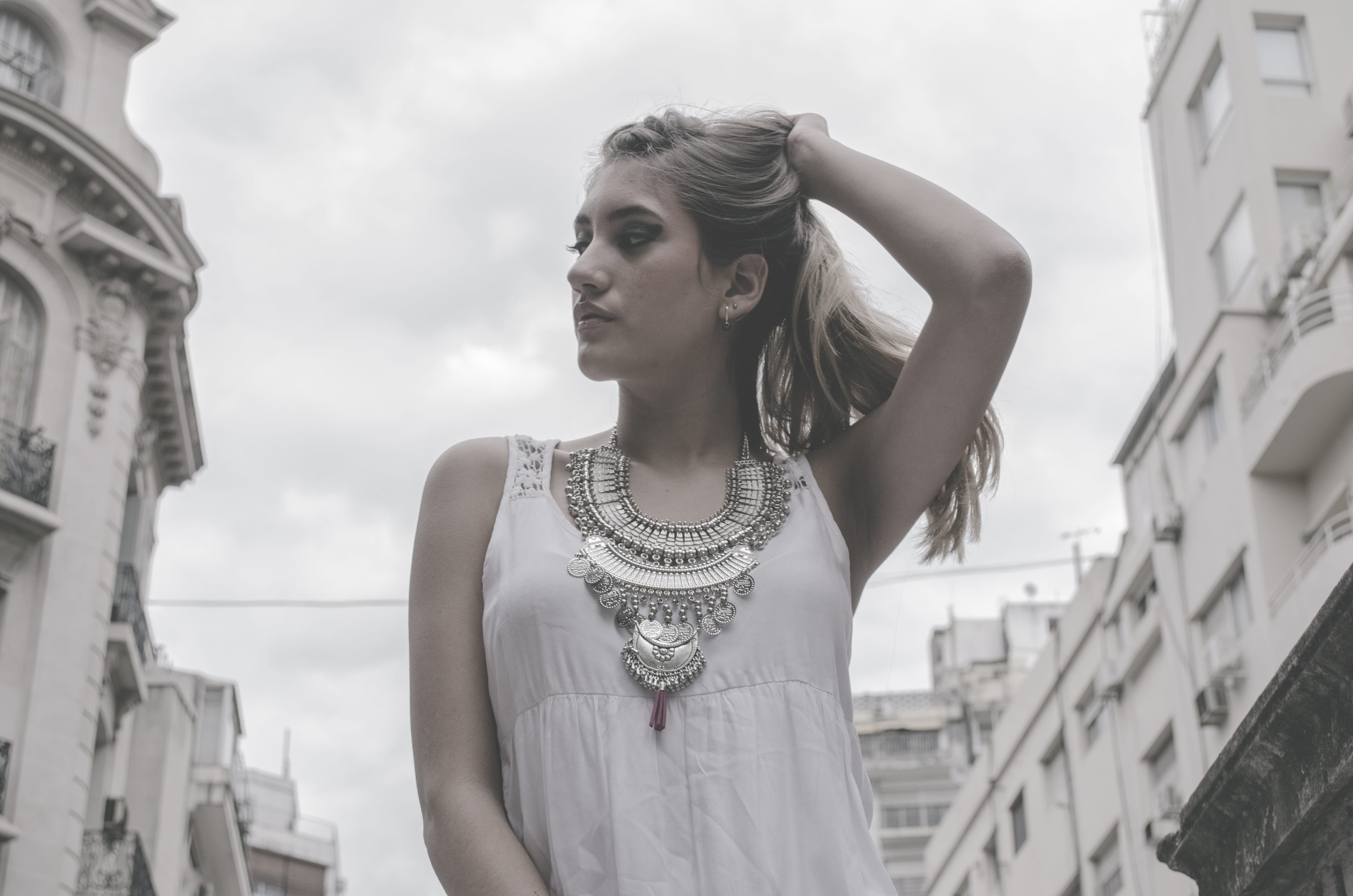built structure, female, young adult, blonde, daytime, focus, girl, holding, architecture, fashion, hair, street, young women, white, 4K, lifestyles, blonde hair, HD Wallpaper