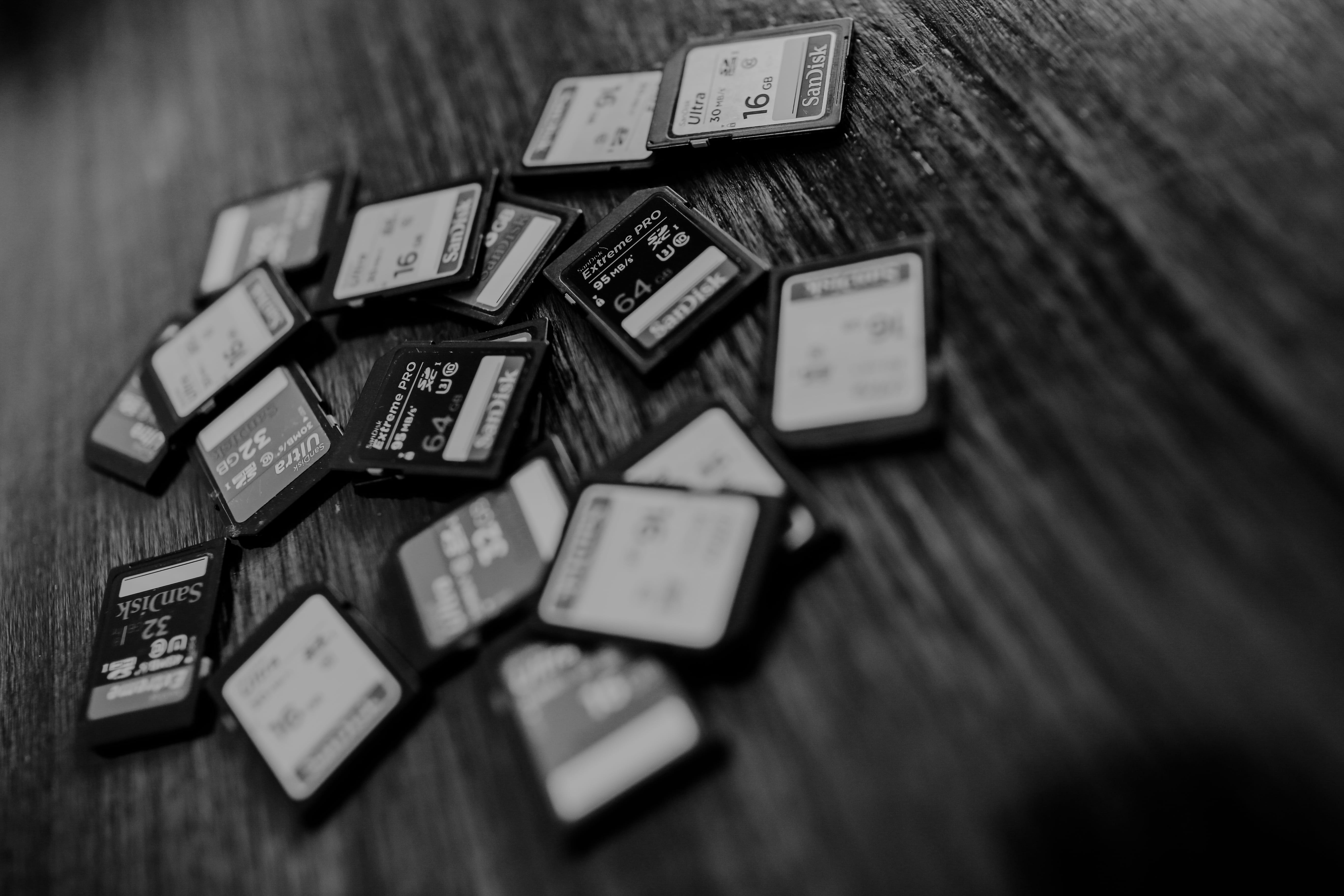 5K, still life, no people, table, wood - material, desk, business, close-up, box, sandisk, day, technology, relaxation, text, high angle view, container, HD Wallpaper