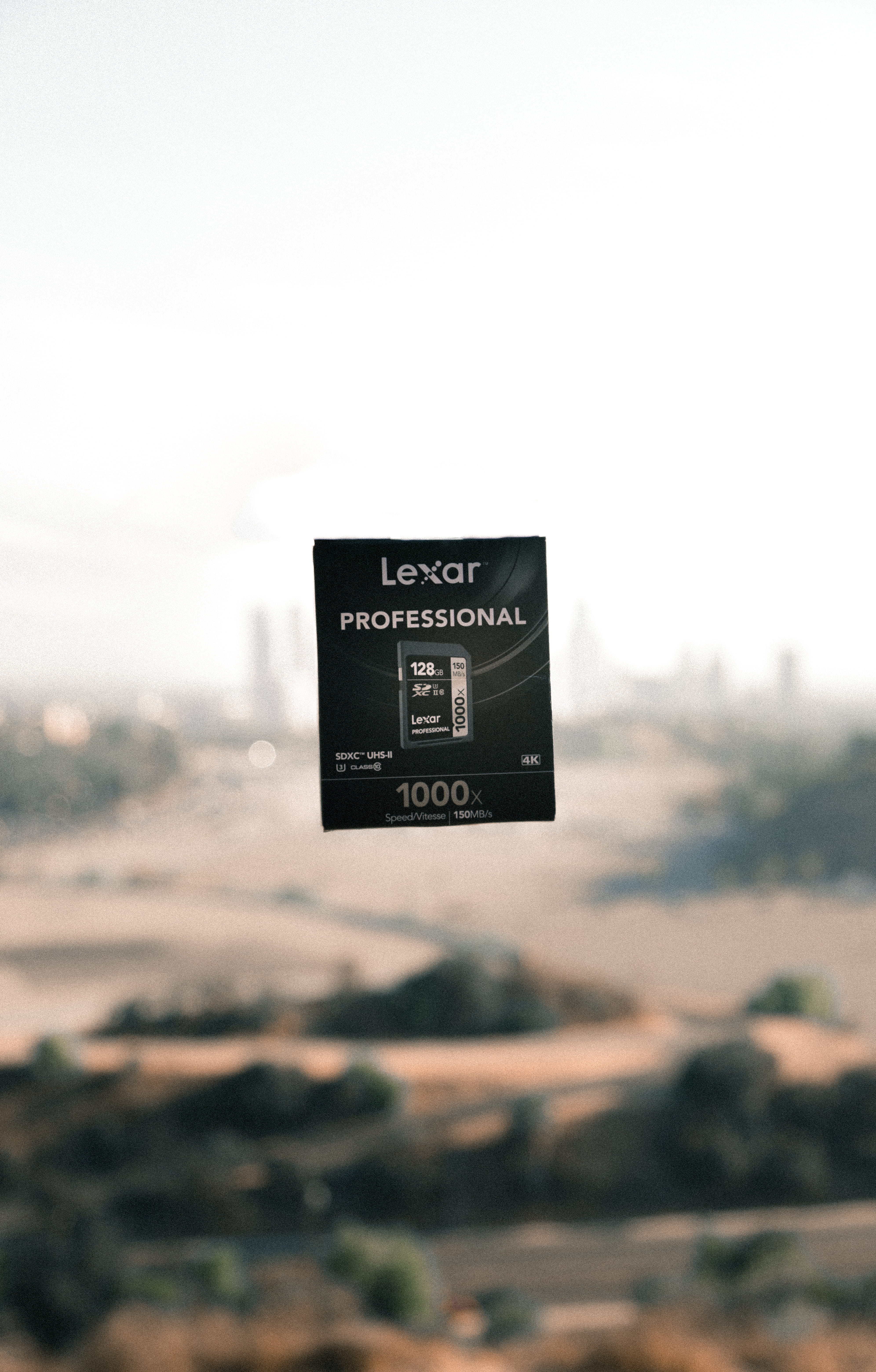 memory card, text, camera gear, sky, photography gear, lexar, information, memory stick, memory, information sign, black color, sd, tech, float, single object, Phone HD Wallpaper