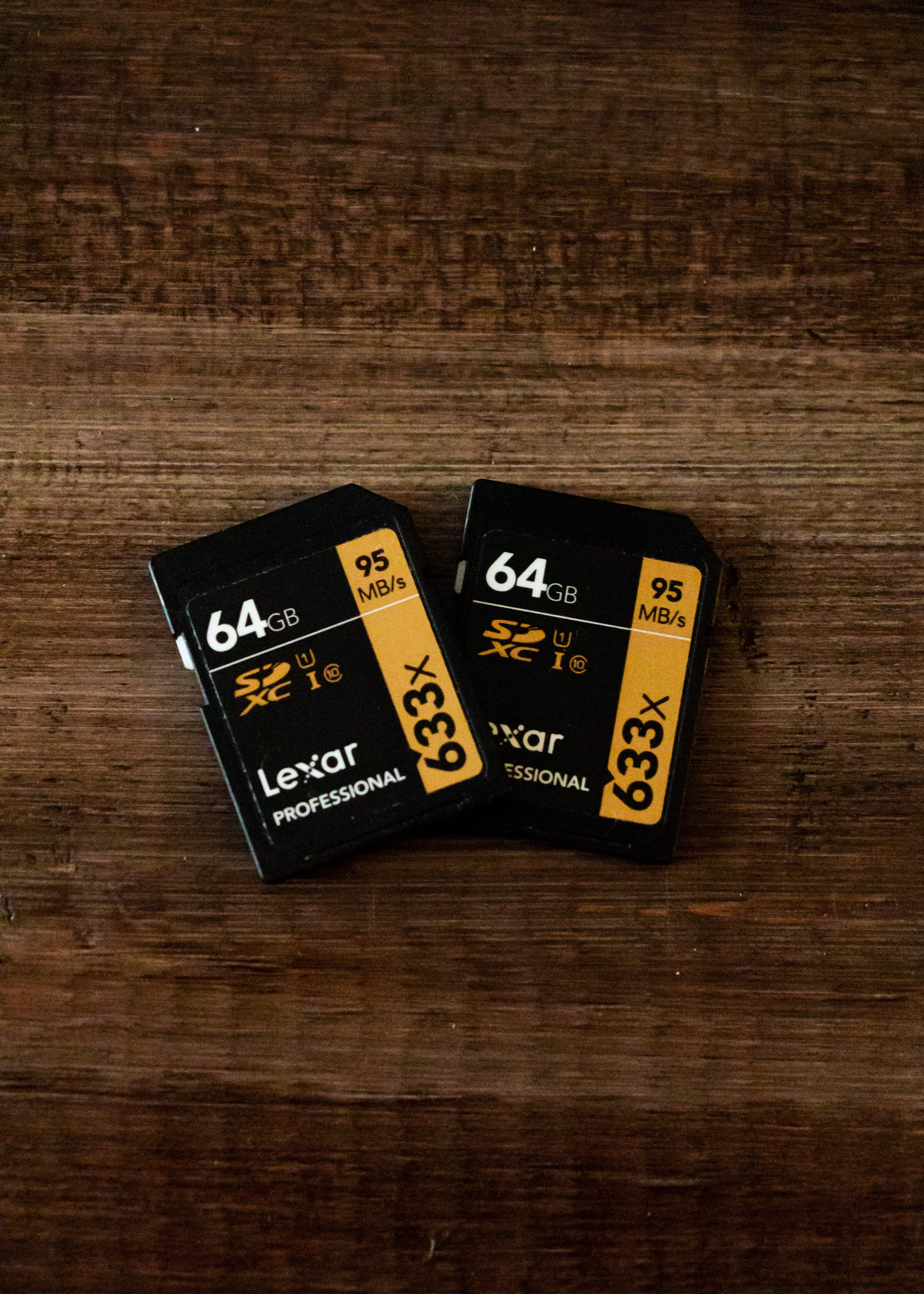 group of objects, black, cards, weapon, text, indoors, lexar, hardware, table, still life, number, two, ammunition, close-up, game of chance, electronics, Phone HD Wallpaper