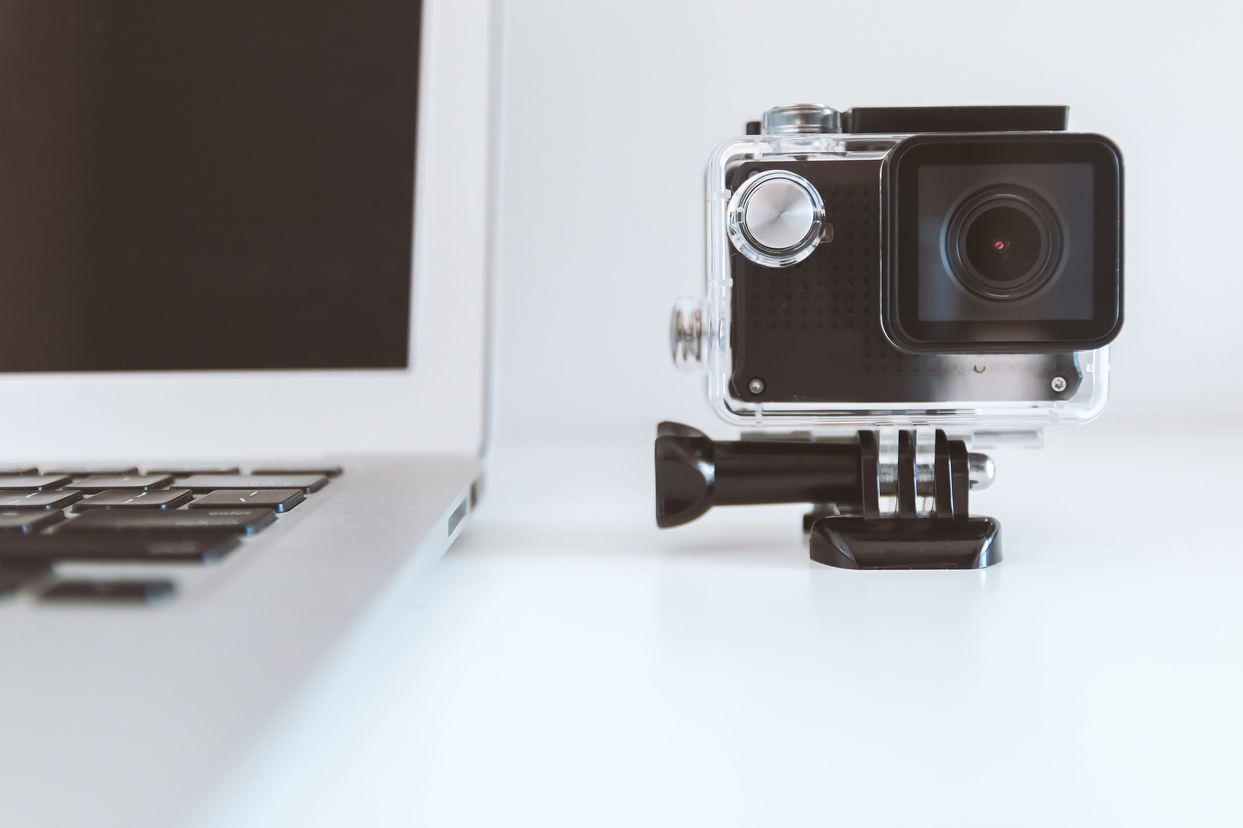 no people, computer equipment, white, macbook, besides, copy space, notebook, black, close-up, camera, action camera, indoors, liquid-crystal display, work, HD Wallpaper