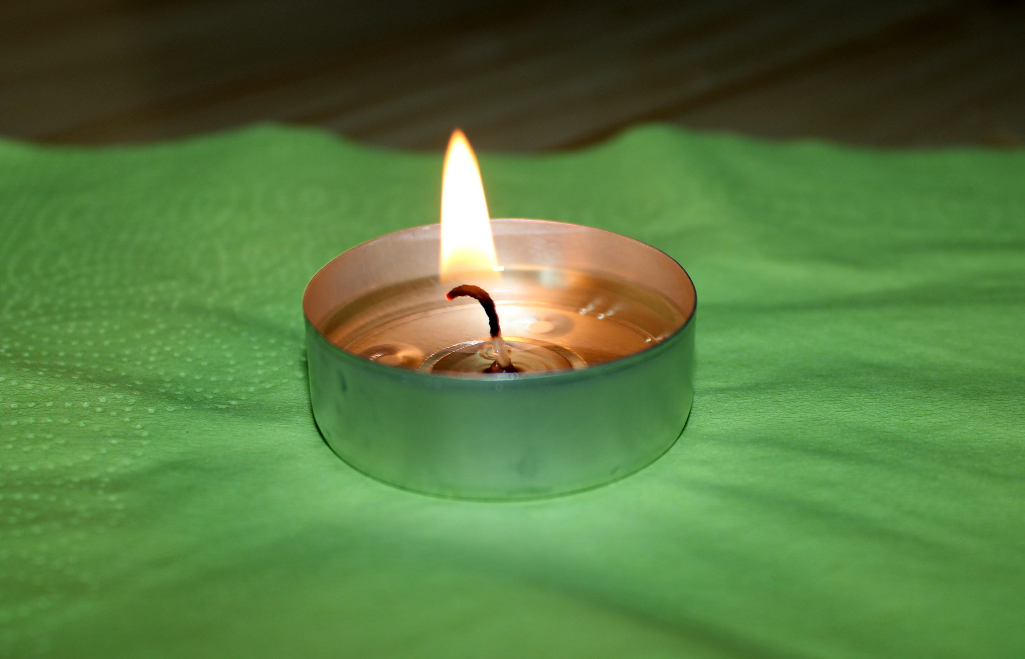 selective focus, event, nature, candle, flame, no people, illuminated, heater, close-up, light - natural phenomenon, indoors, mood, 4K, green color, fire - natural phenomenon, HD Wallpaper