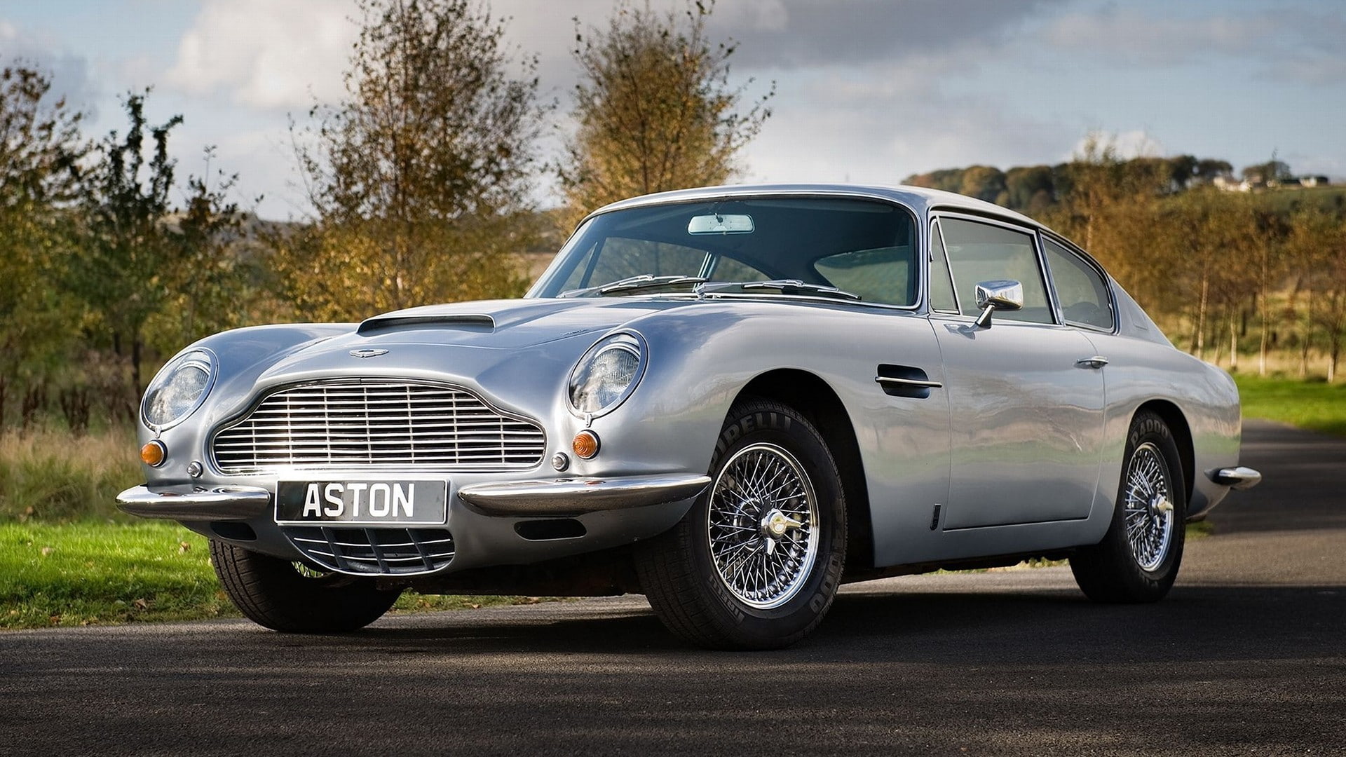 tree, city, silver colored, nature, plant, no people, motor vehicle, road, vintage car, sunlight, land vehicle, sky, chrome, day, Oldtimer, Aston Martin DB5, HD Wallpaper