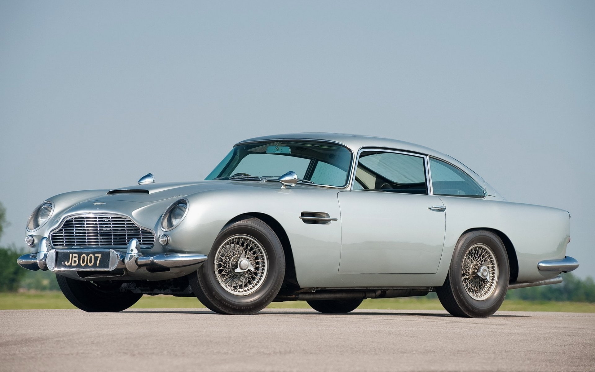 land vehicle, Aston Martin, tire, copy space, transportation, blue, silver colored, people, aston martin DB5, sports car, retro styled, vintage car, wheel, HD Wallpaper