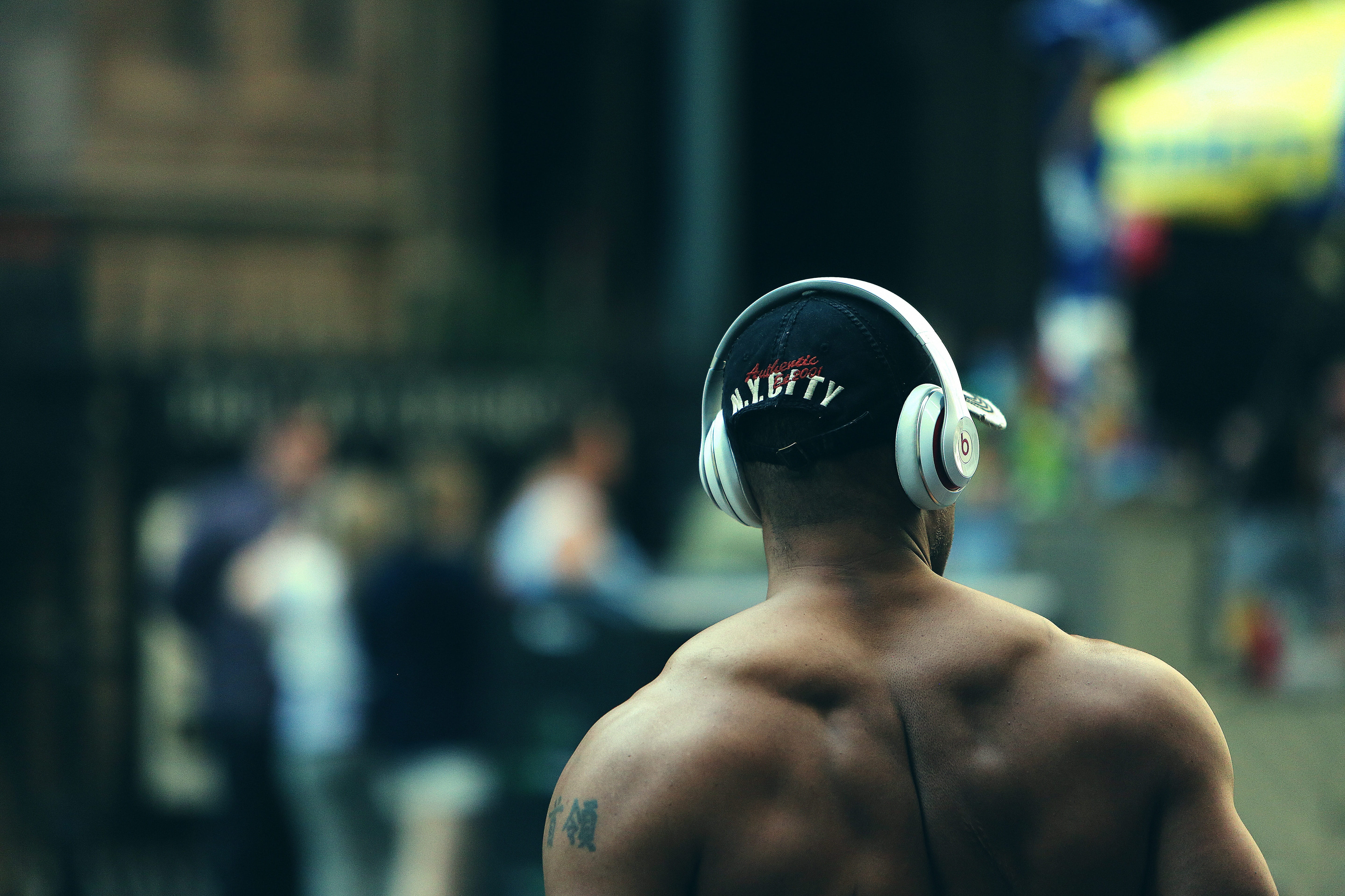 headshot, training, exercise, bodybuilder, rear view, sport, young men, man, headphones, one person, lifestyle, hat, beats, 5K, muscles, city, watching, HD Wallpaper